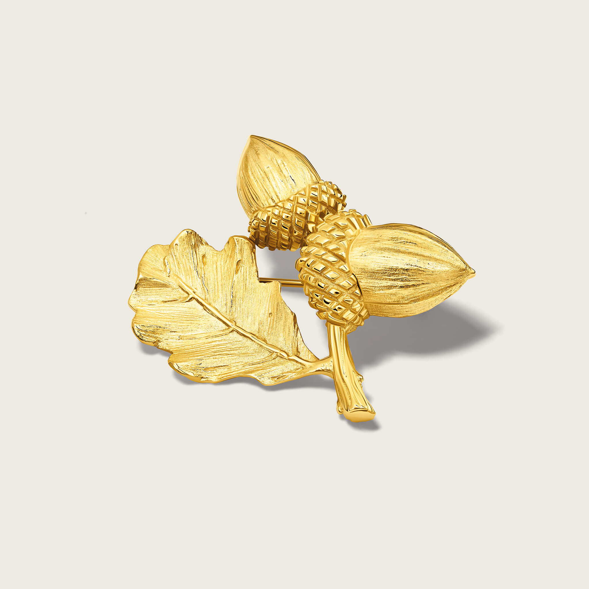 Handcrafted bespoke brooch in yellow gold