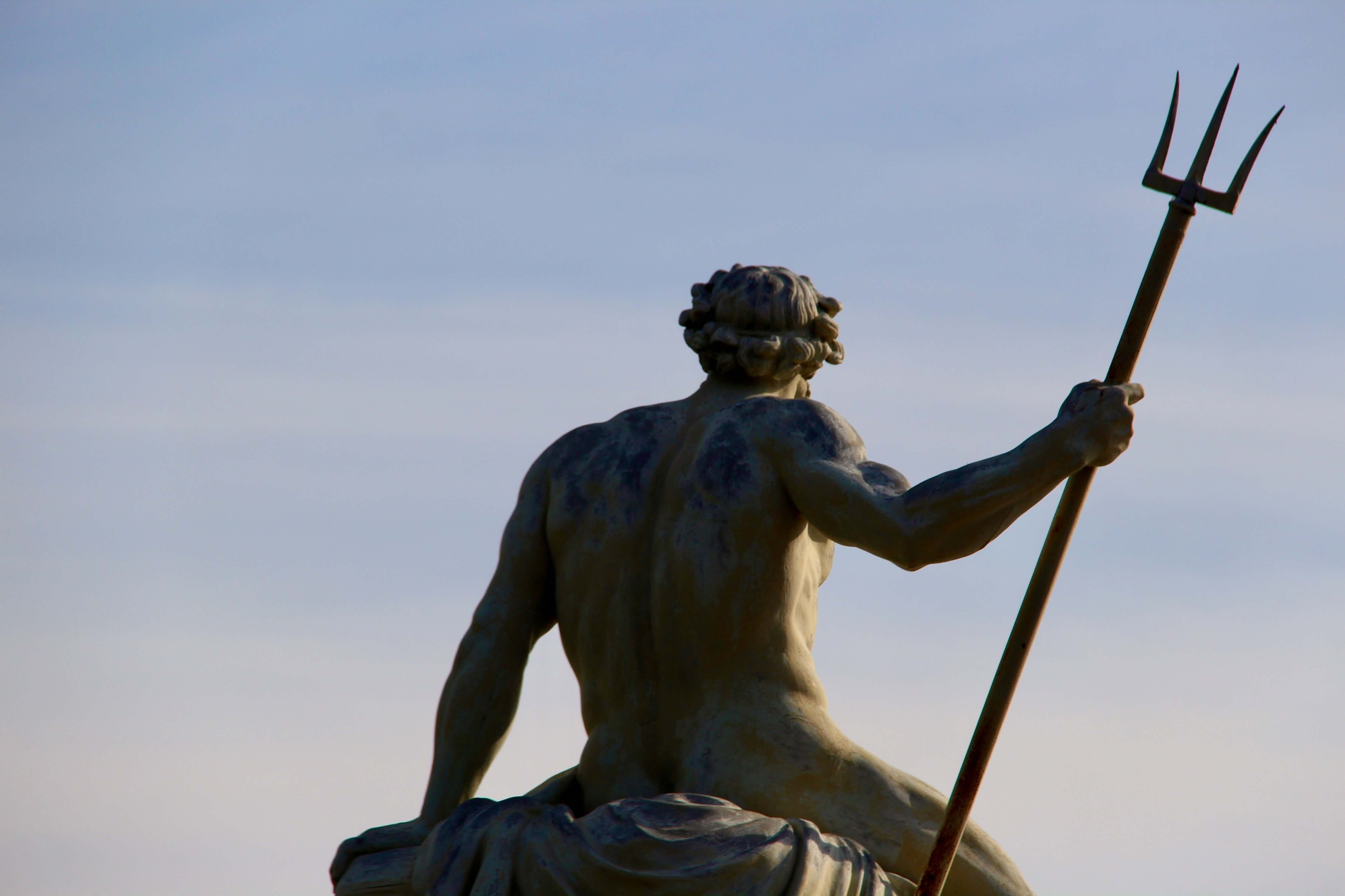 statue holding trident