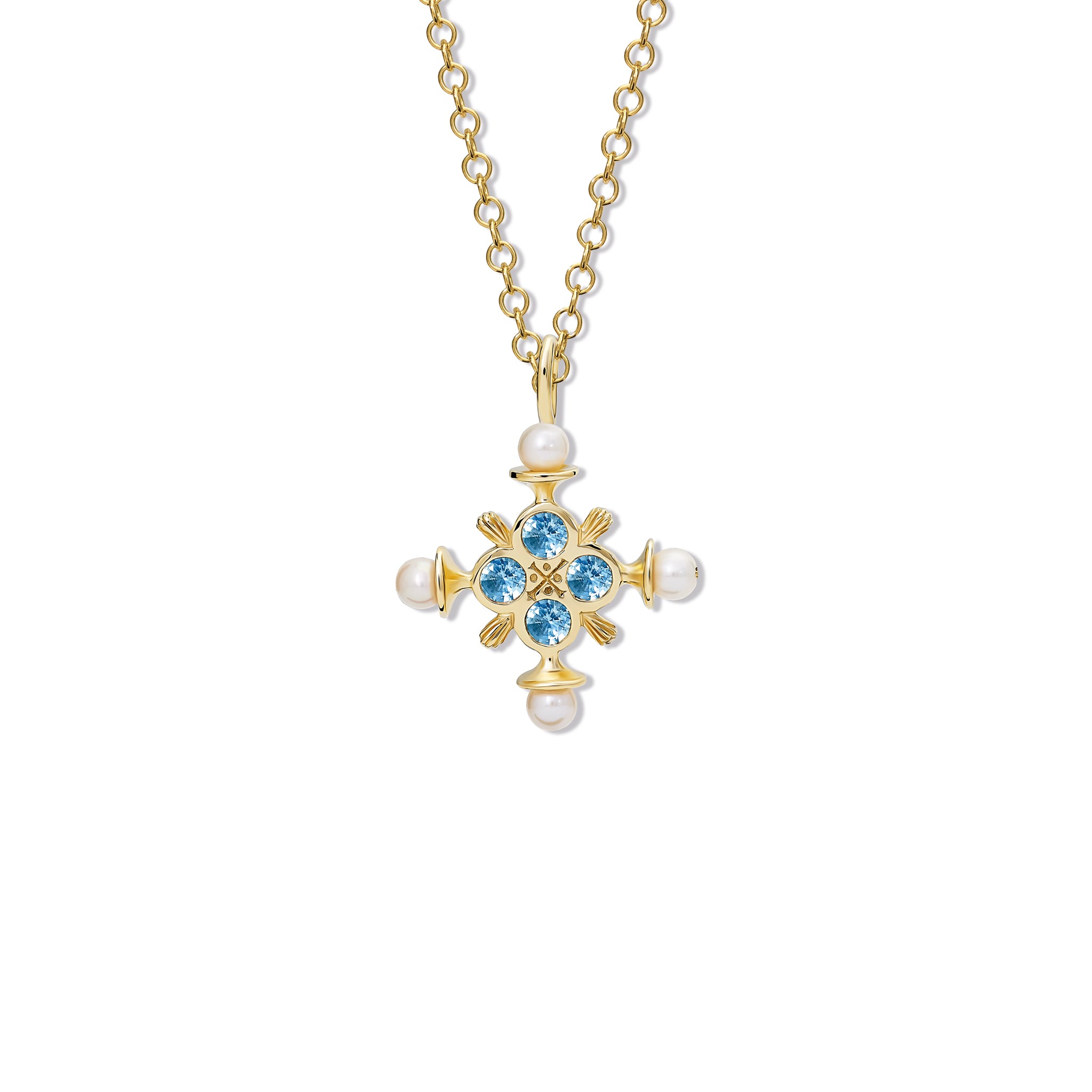 Handcrafted yellow gold cross pendant with blue topaz and pearls, birthstone of November.