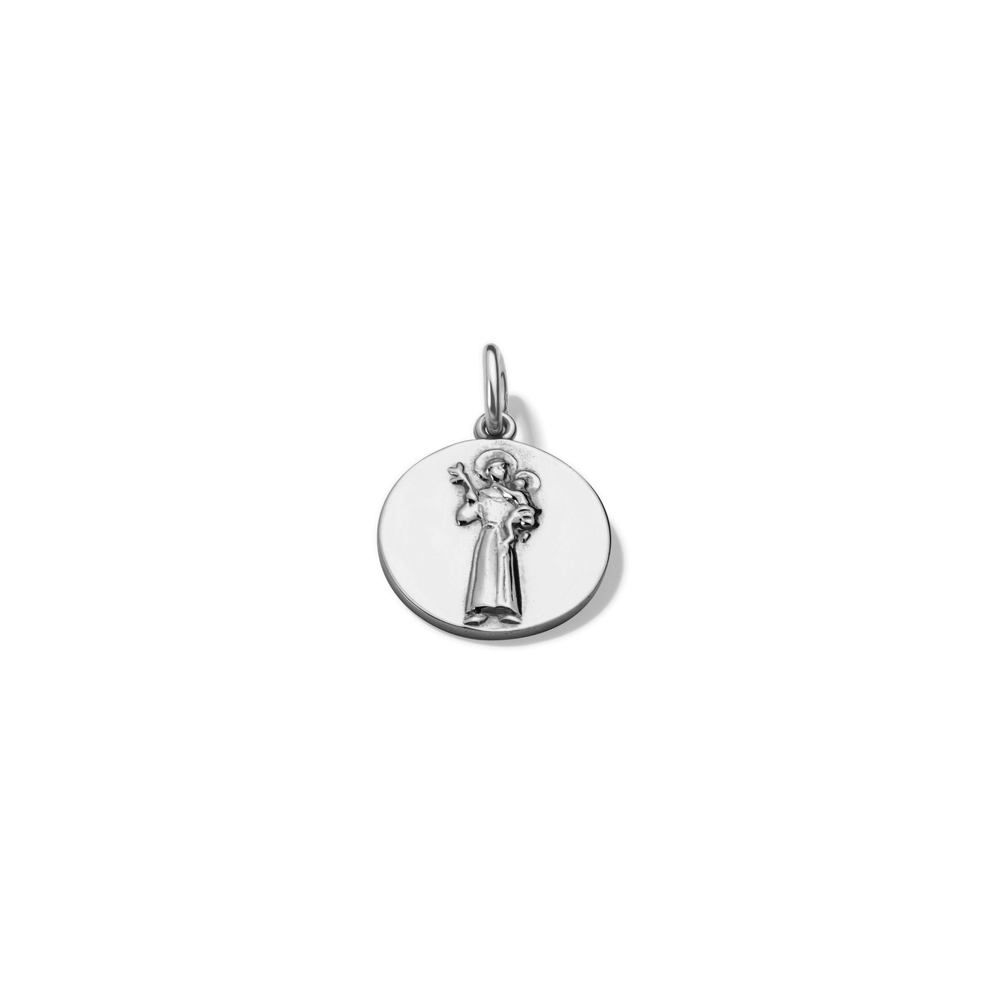 Handcrafted round sterling silver necklace pendant featuring an engraving of Saint Francis, with a loop at the top for chain attachment.