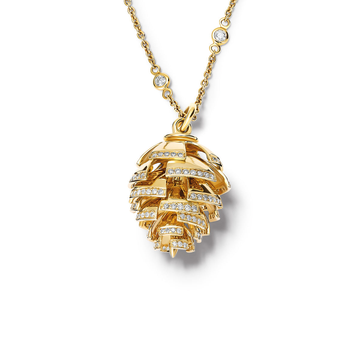 The Furu Kongle necklace pendant in precious metal featuring diamond pavé, hanging from a necklace pendant featuring diamonds.