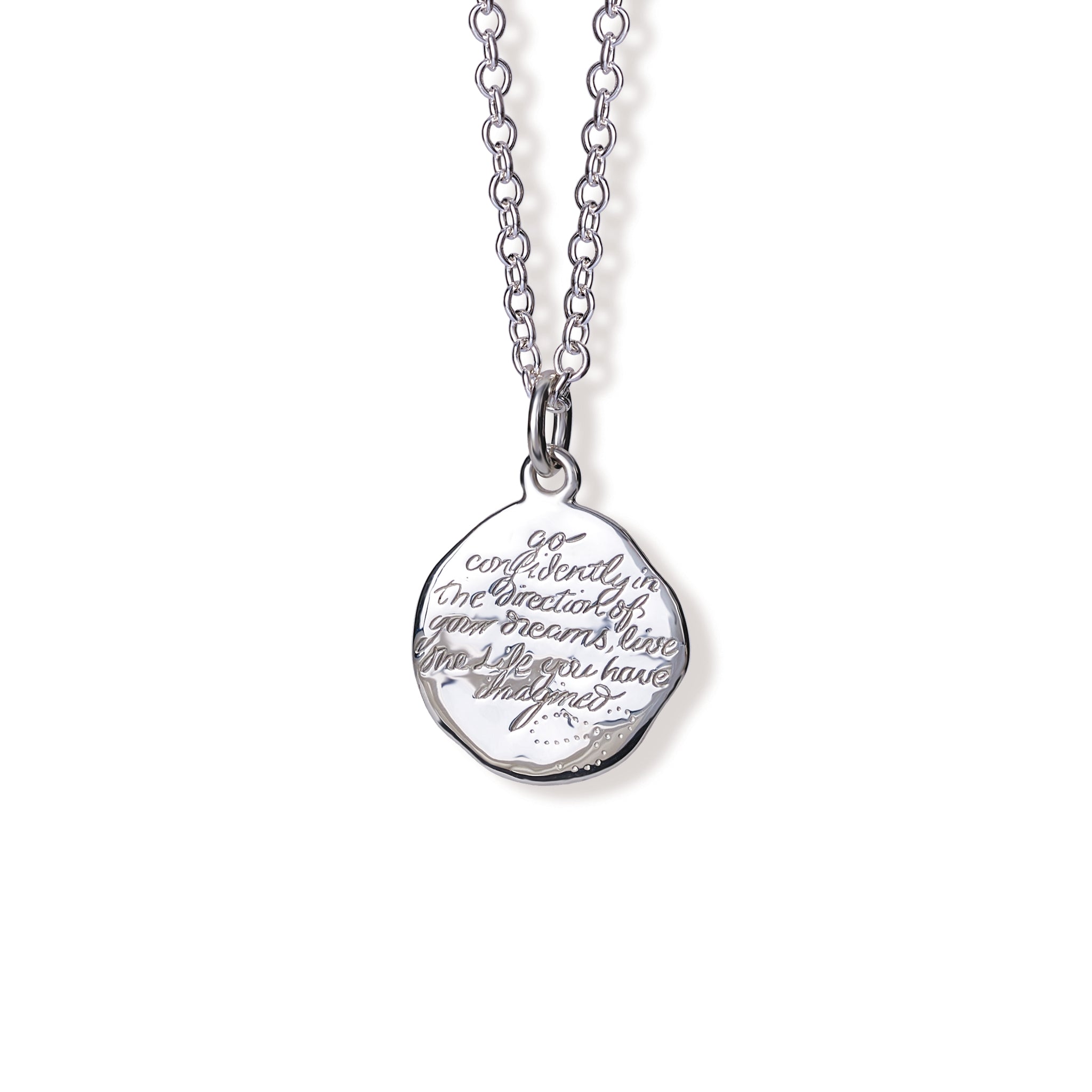 Handcrafted sterling silver necklace pendant engraved with the quote, 'Go confidently in the direction of your dreams. Live the life you have imagined.'