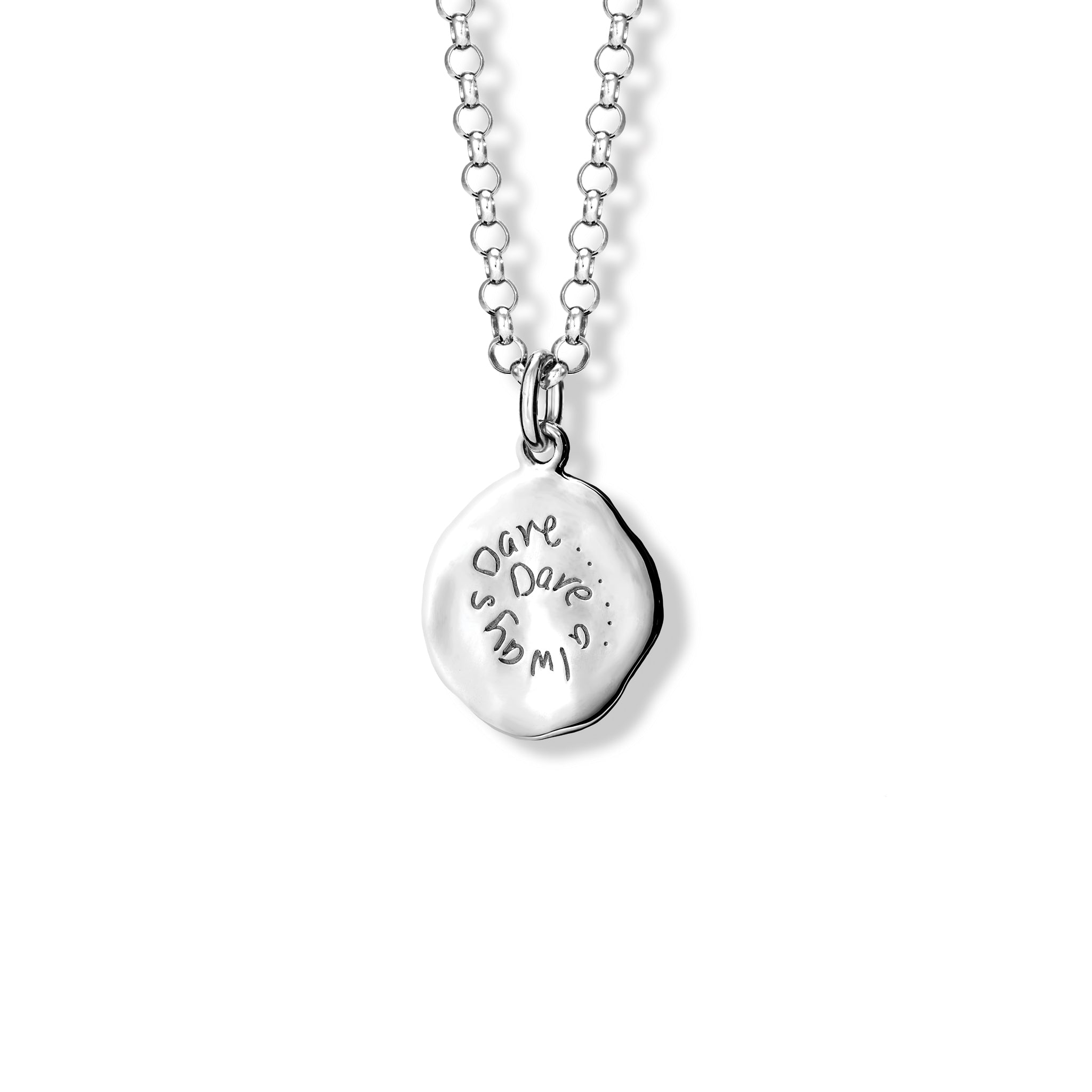 Handcrafted round sterling silver necklace pendant engraved with the quote,  'Dare, always dare.'