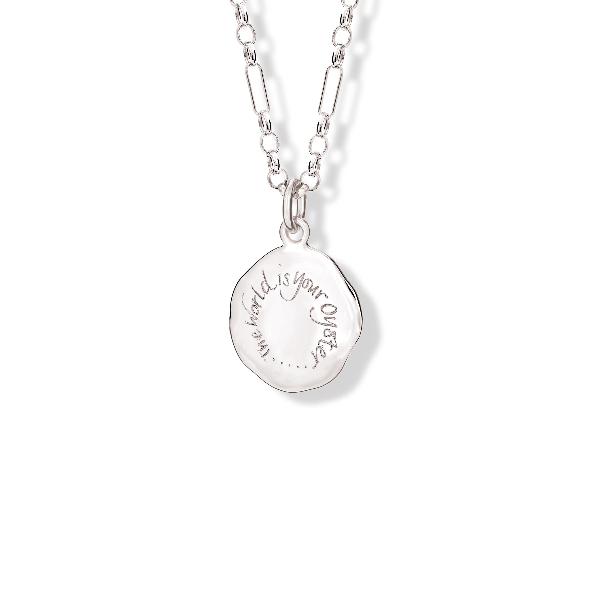 Handcrafted sterling silver round necklace pendant engraved with the quote 'The world is your oyster.'