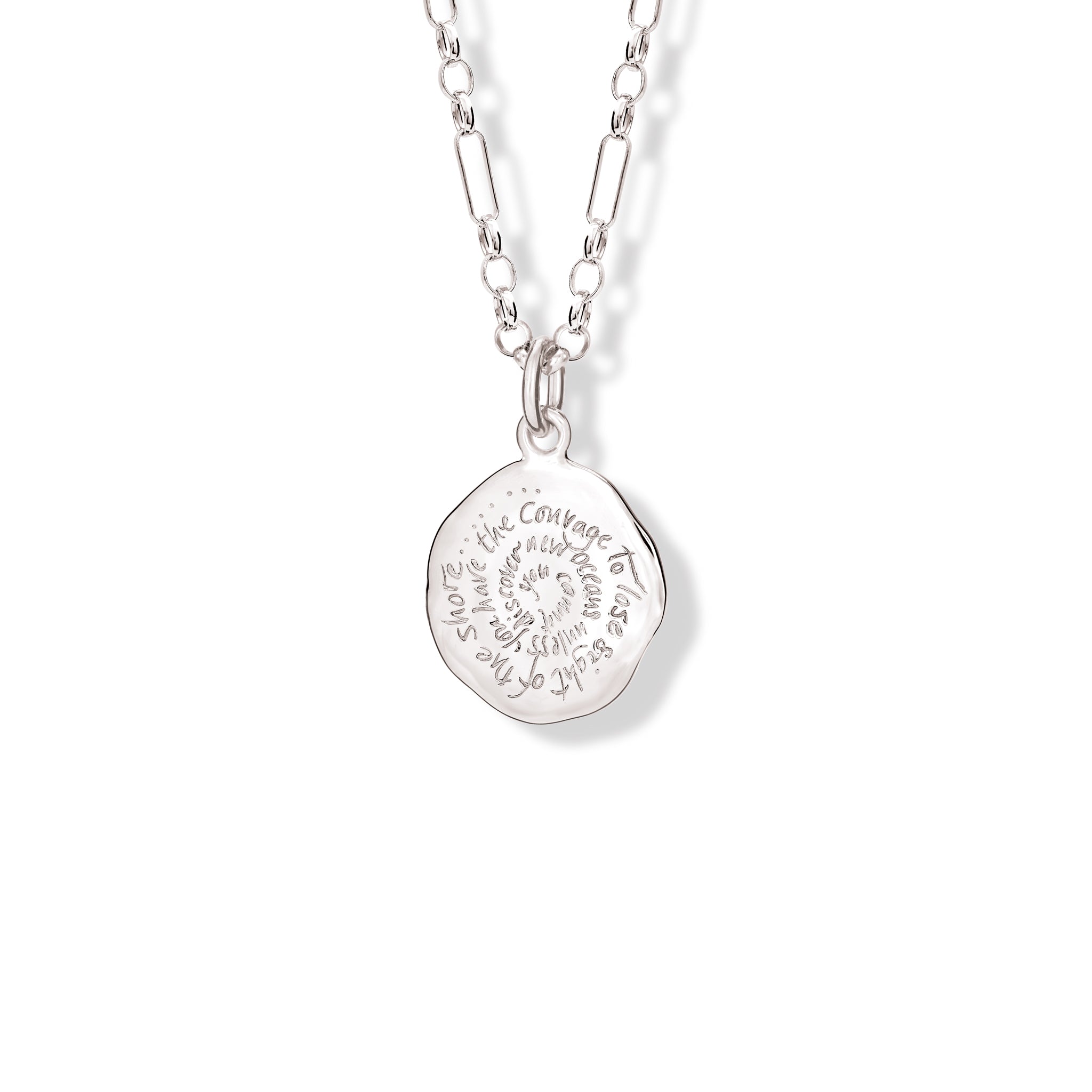 Handcrafted sterling silver round necklace pendant engraved with the quote, 'You cannot discover new oceans unless you have the courage to lose sight of the shore.'