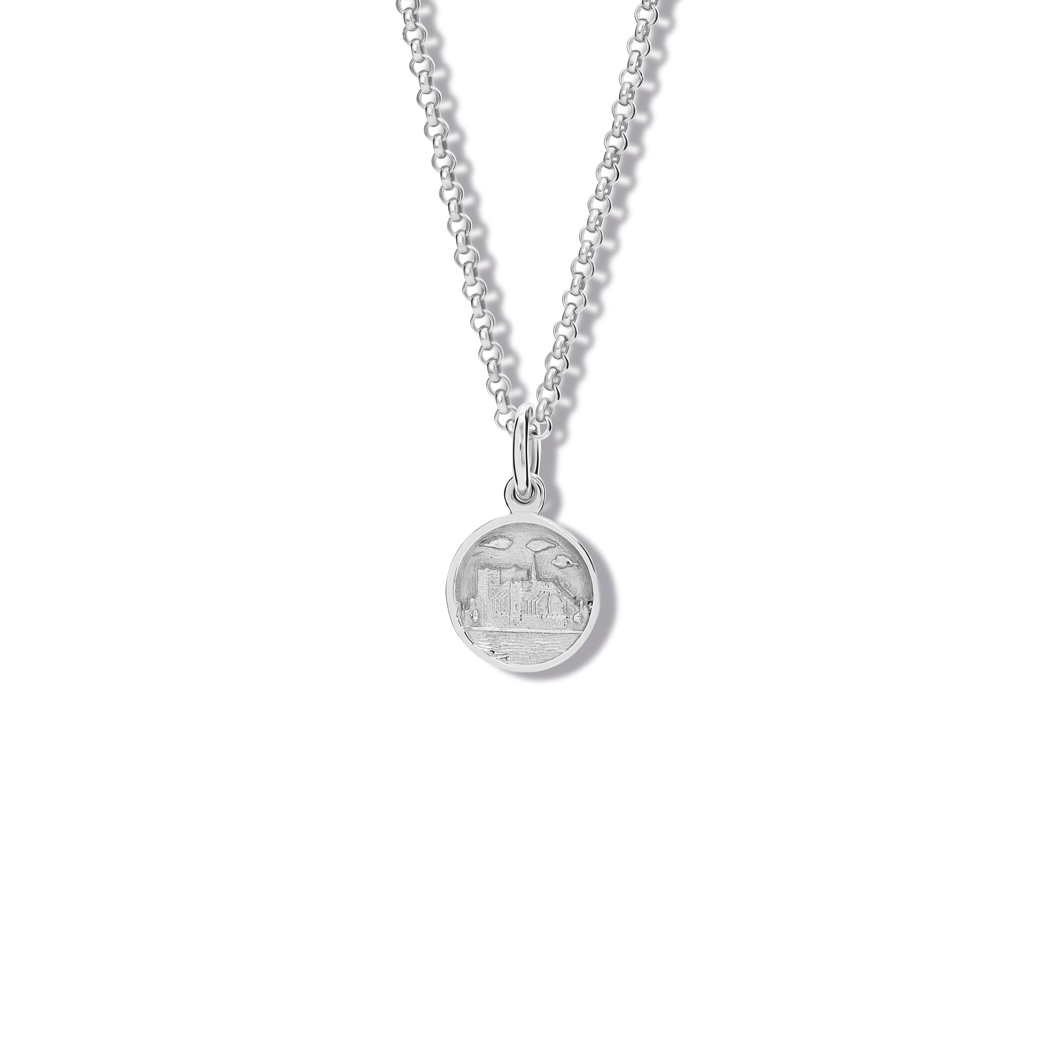 Handcrafted sterling silver necklace pendant 'en relief' with the Notre Dame in Paris, France.