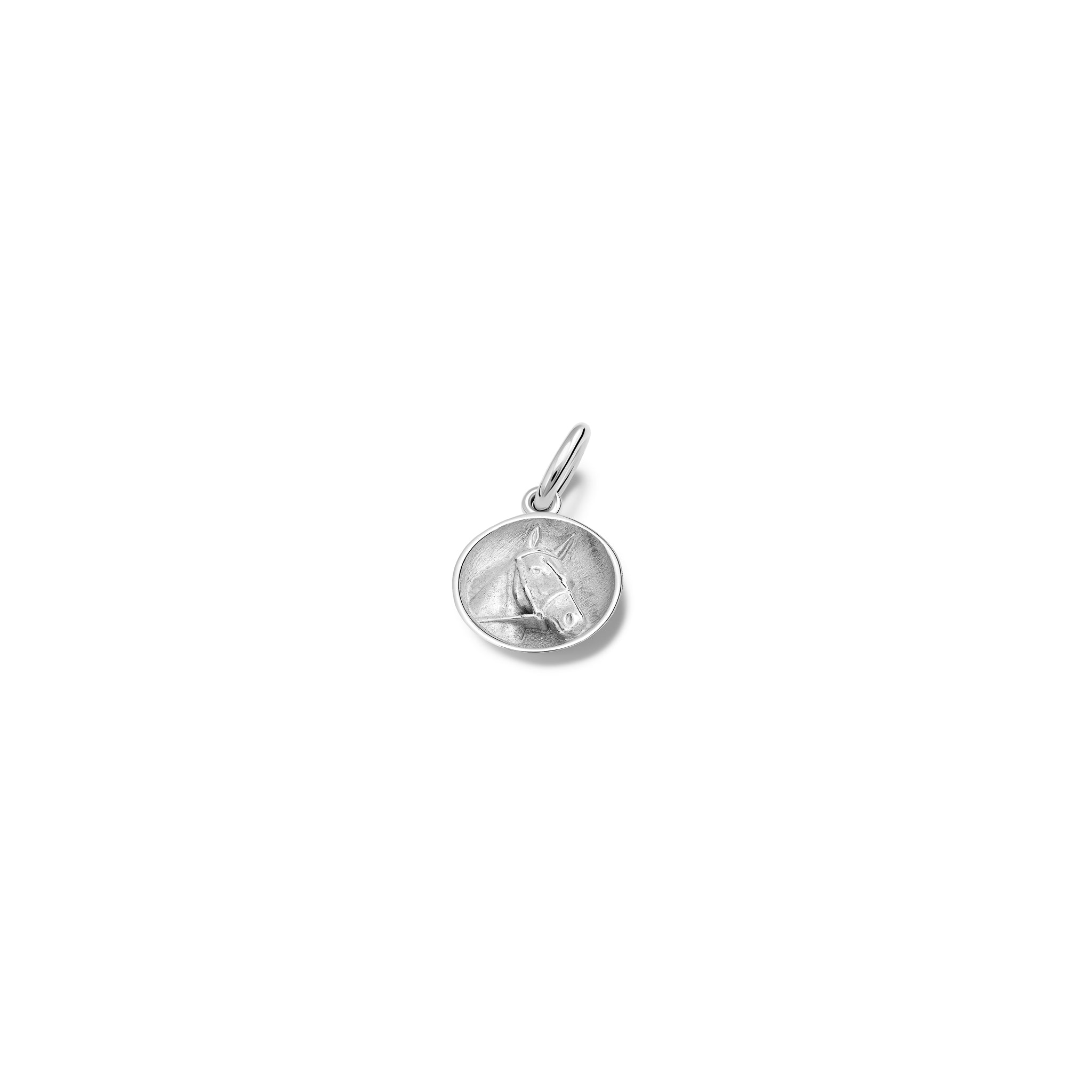 Handcrafted sterling silver necklace pendant 'en relief' with a horse in France.
