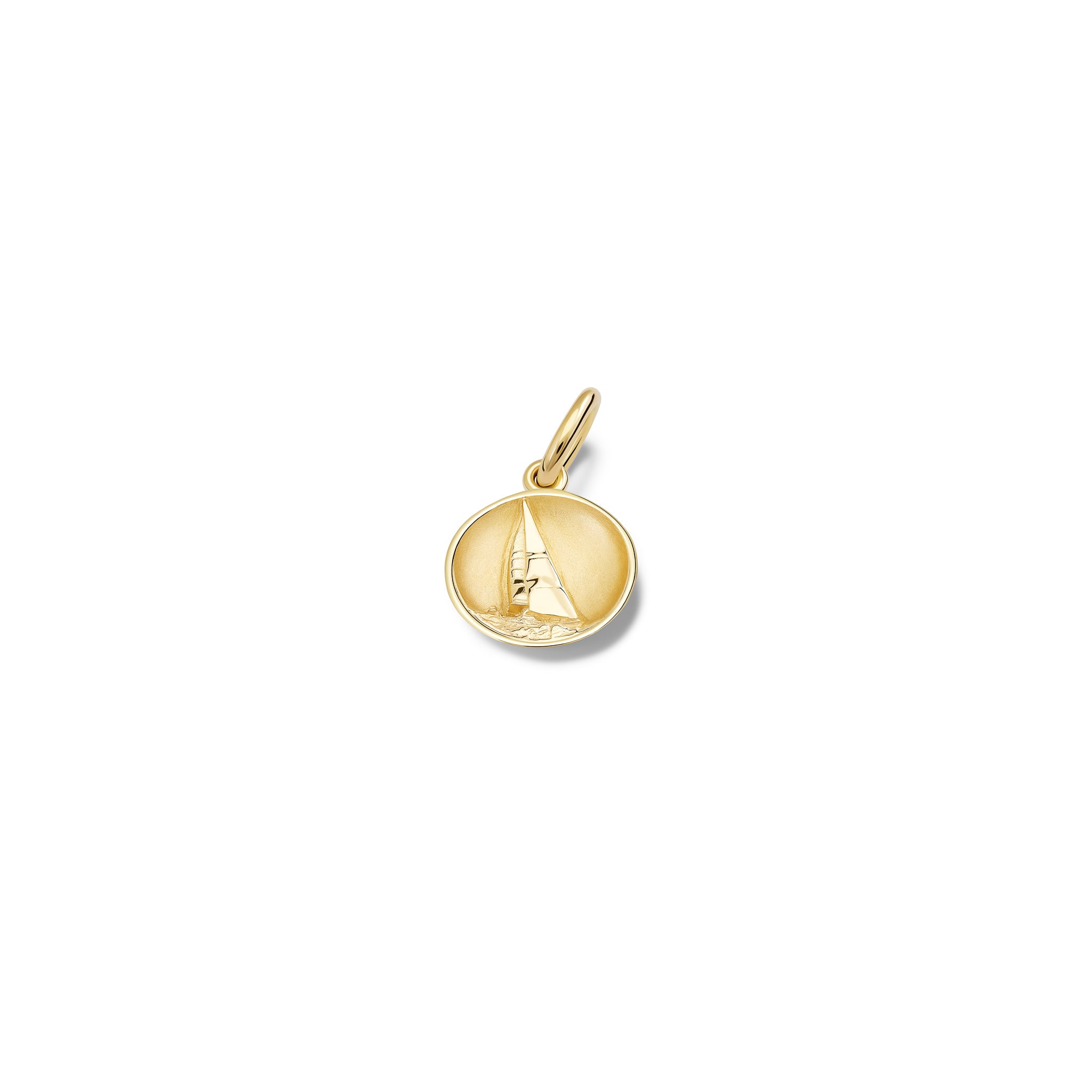 Handcrafted yellow gold necklace pendant 'en relief' with a sailing boat in France.