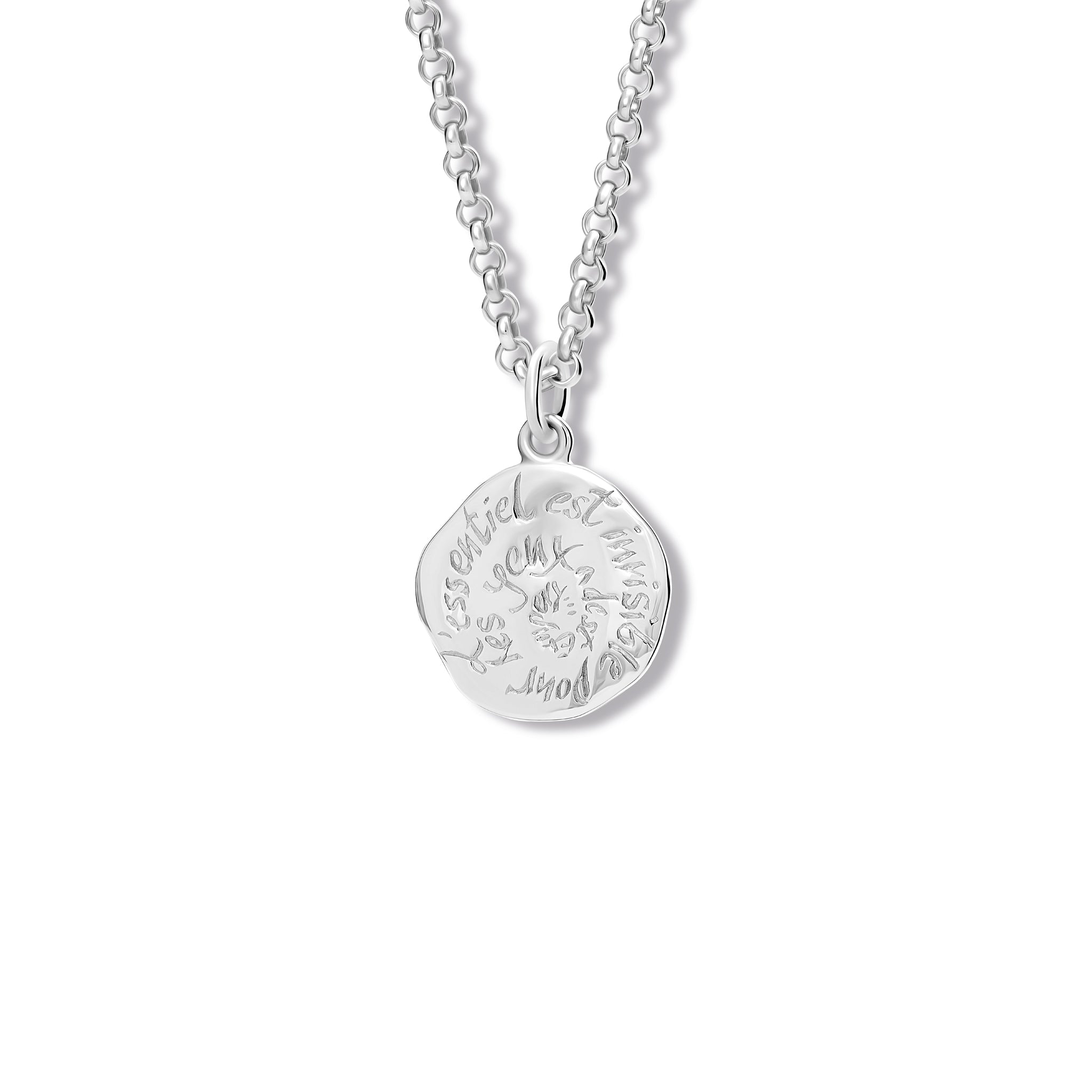 Handcrafted sterling silver necklace pendant engraved with the quote, 'L'essentiel est invisible pour les yeux.'