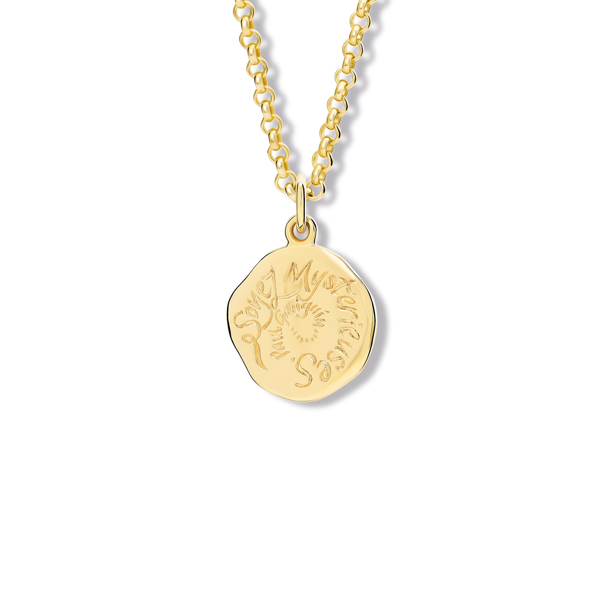 Handcrafted yellow gold necklace pendant engraved with the quote, 'Soyez Myst�rieuses.'