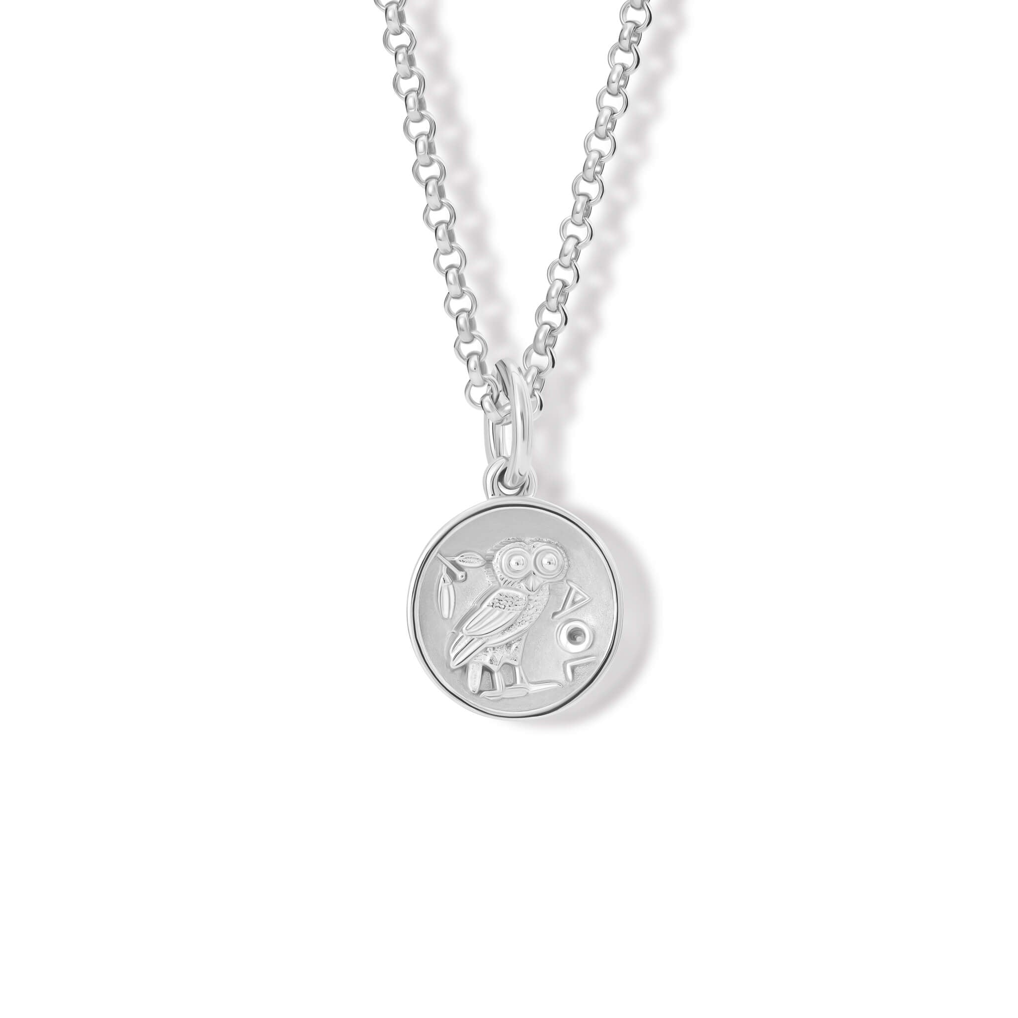 Handcrafted silver necklace pendant with an owl 'en relief'.