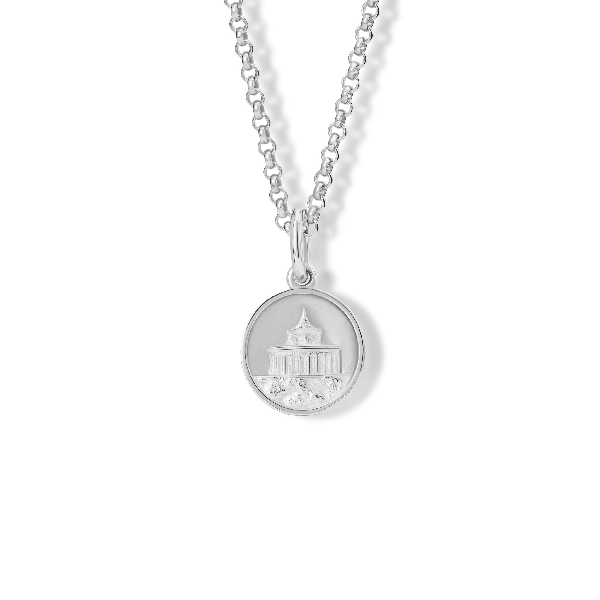 Handcrafted silver necklace pendant with a lighthouse 'en relief'.