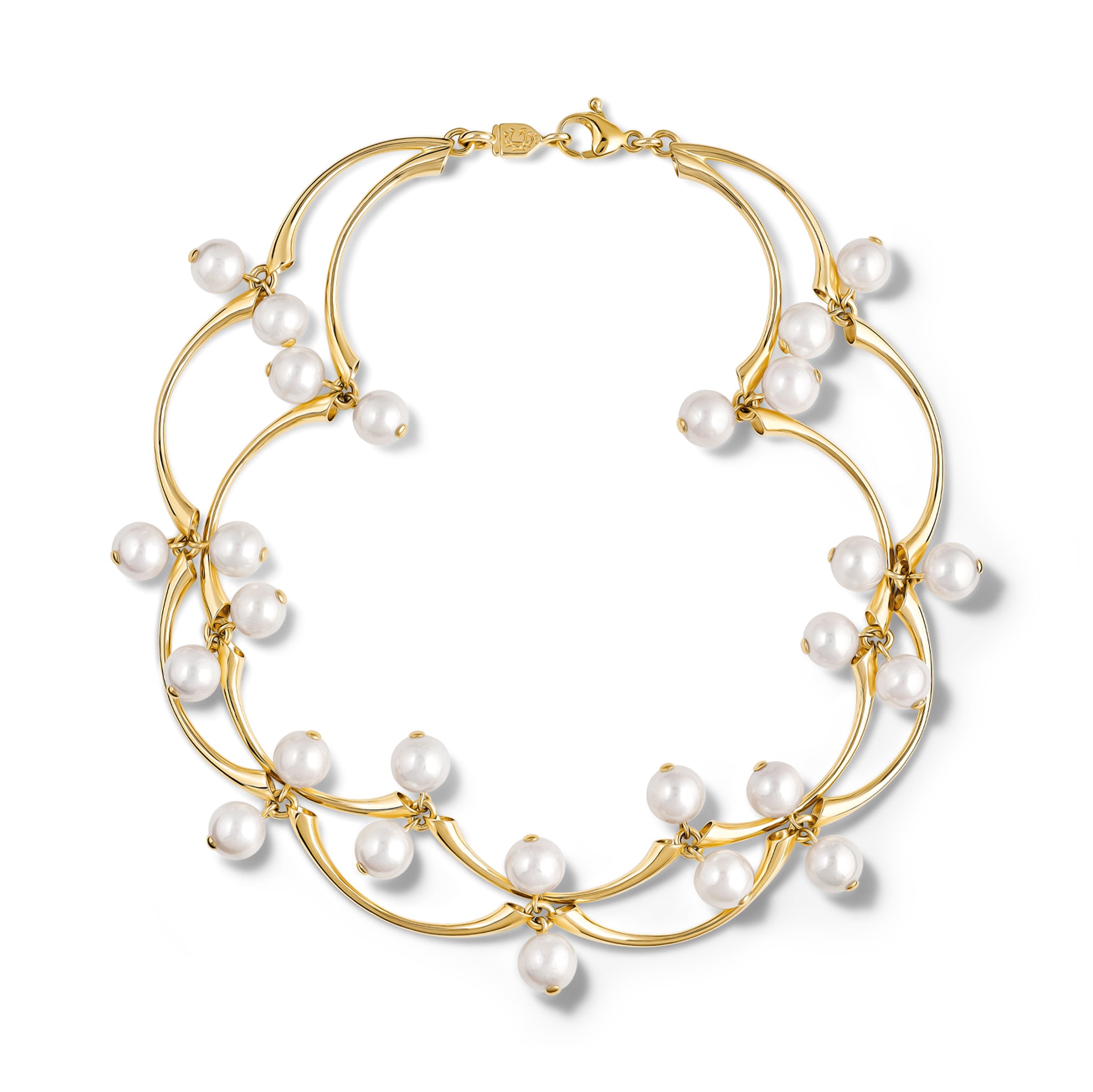 Handcrafted yellow gold necklace in the shape of waves with pearls.