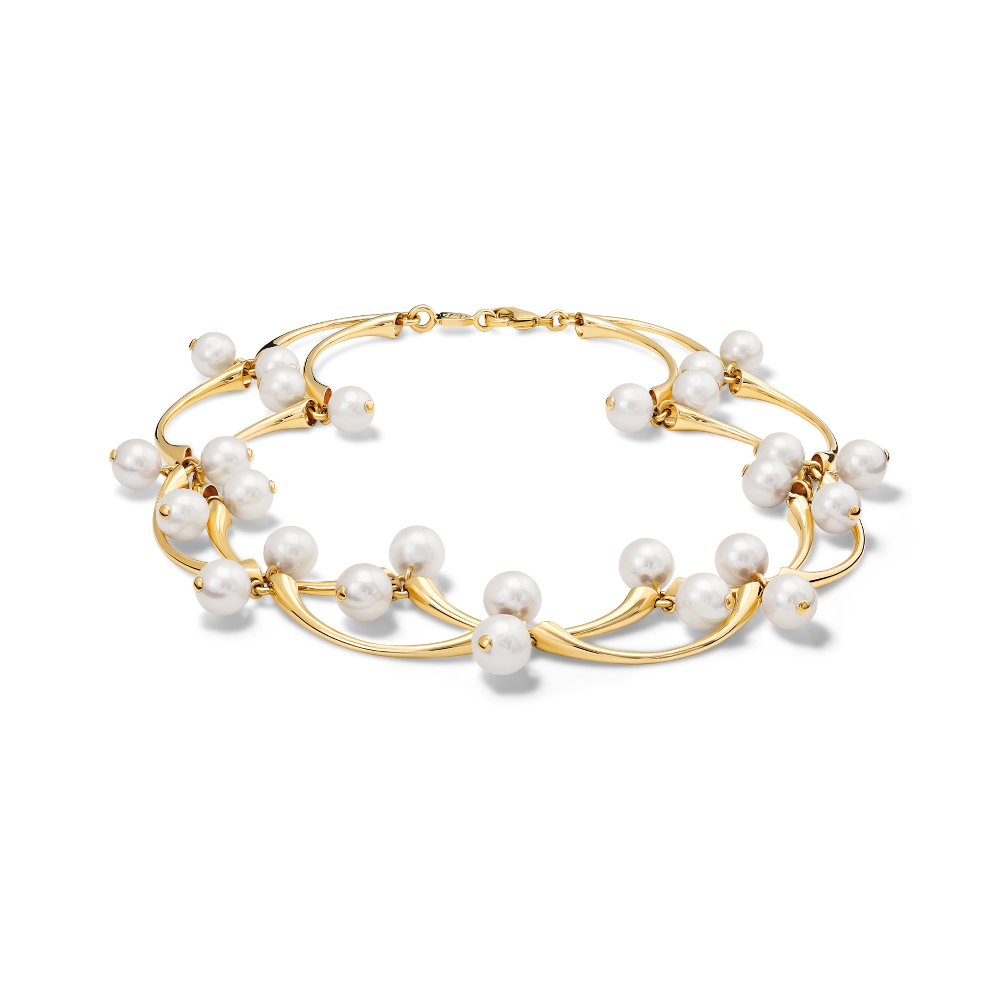Handcrafted yellow gold necklace in the shape of waves with pearls.