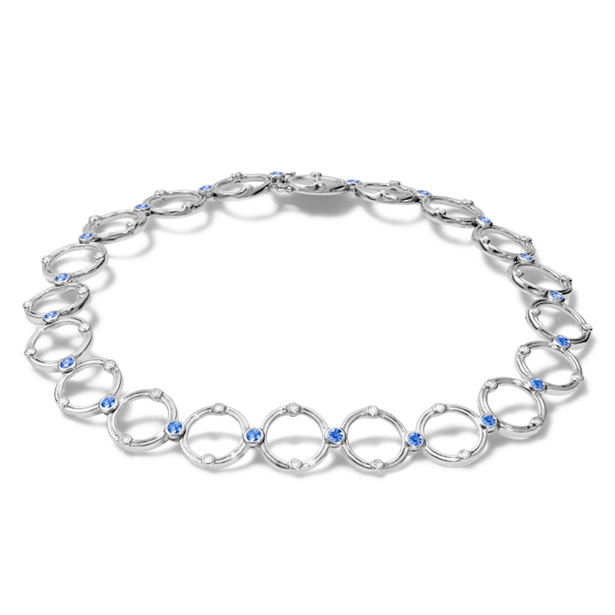 Handcrafted 18ct white gold necklace featuring circular shapes with sapphires and diamonds.