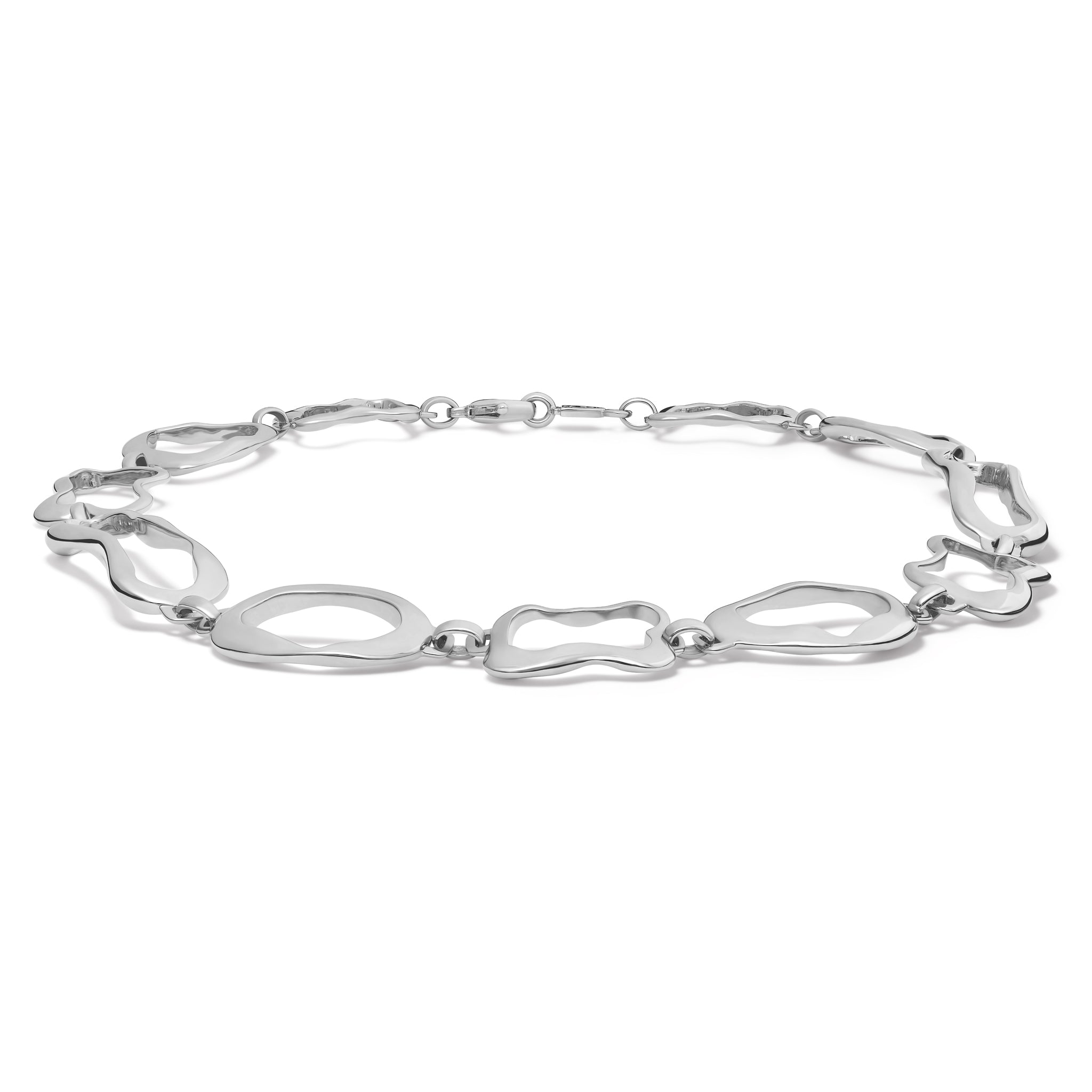 Handcrafted sterling silver necklace featuring the outlines of french pastries: ?clair, canel?, pain au chocolat and croissant.