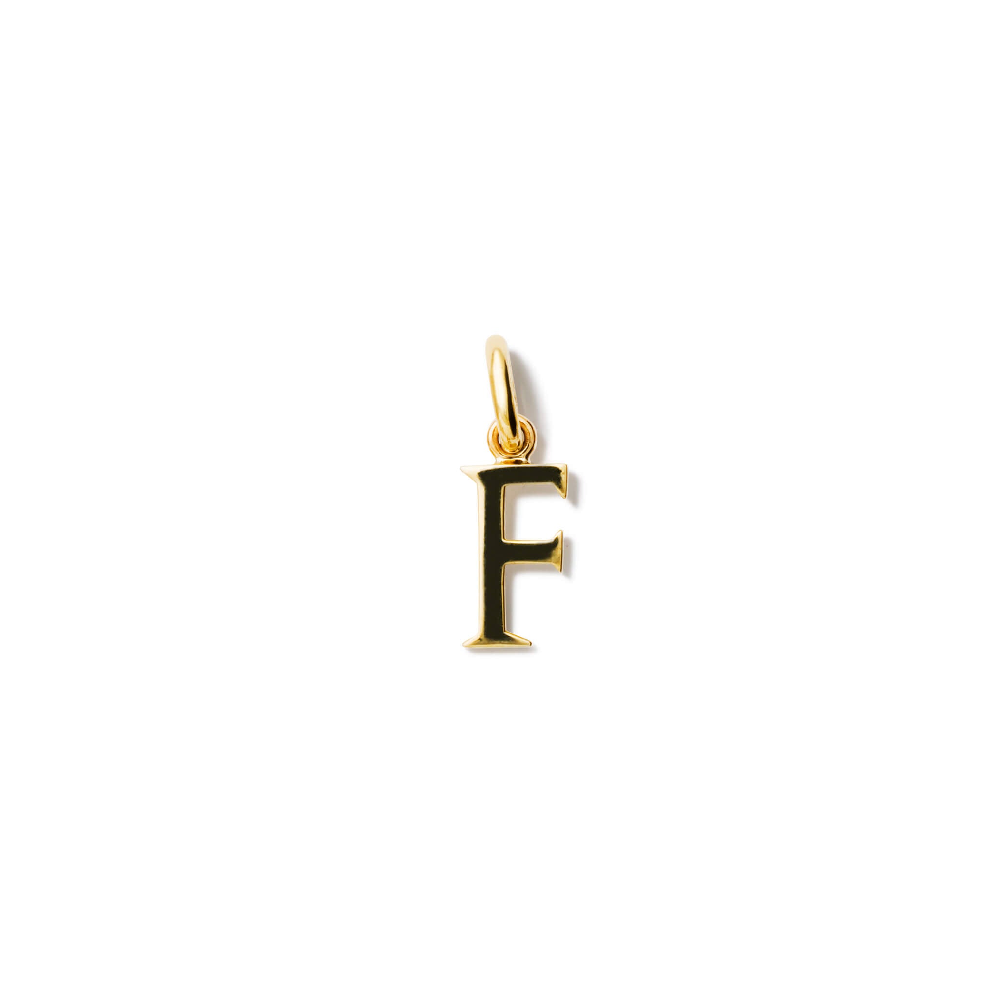 Handcrafted yellow gold initial F necklace pendant, with a loop at the top for chain attachment.
