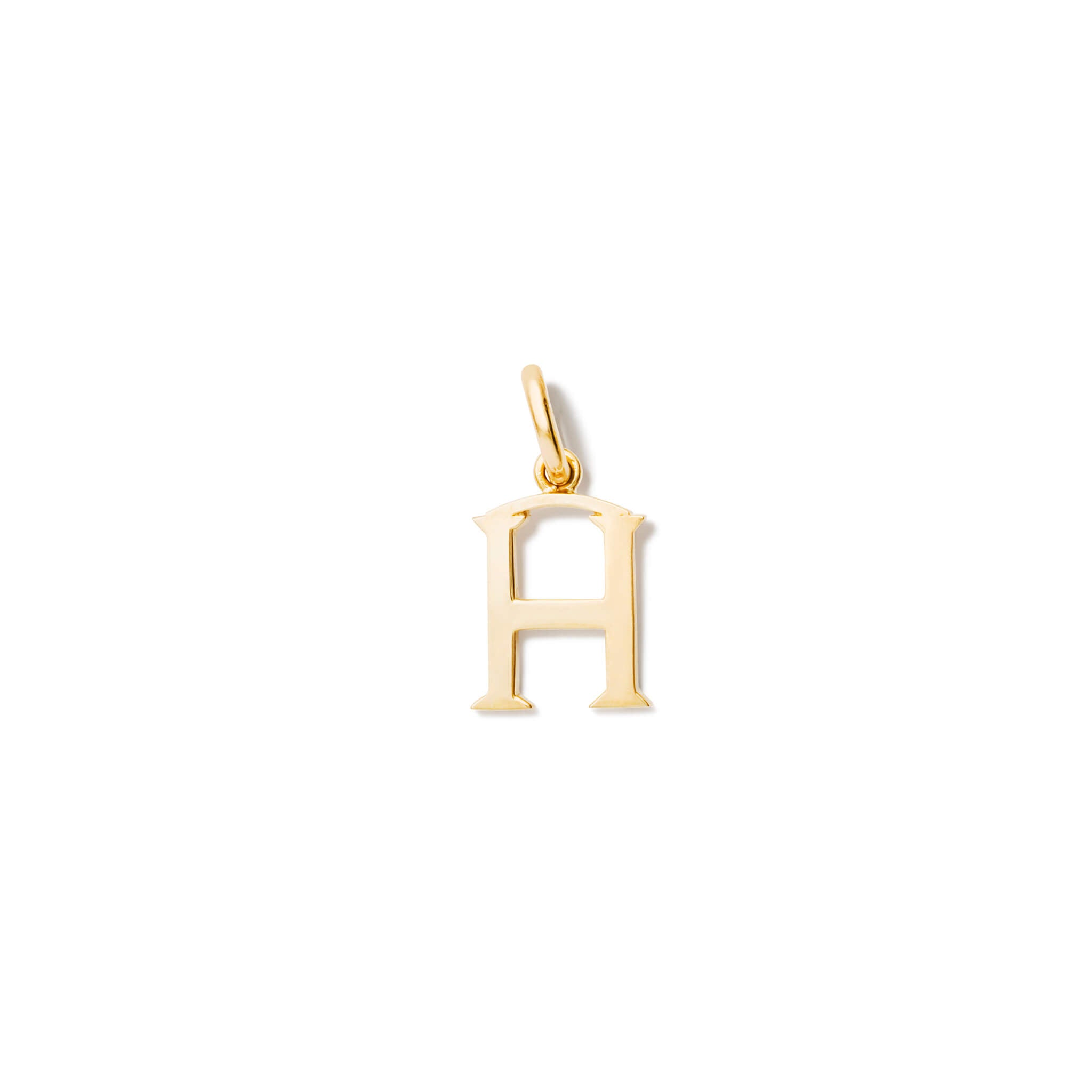 Handcrafted yellow gold initial H necklace pendant, with a loop at the top for chain attachment.
