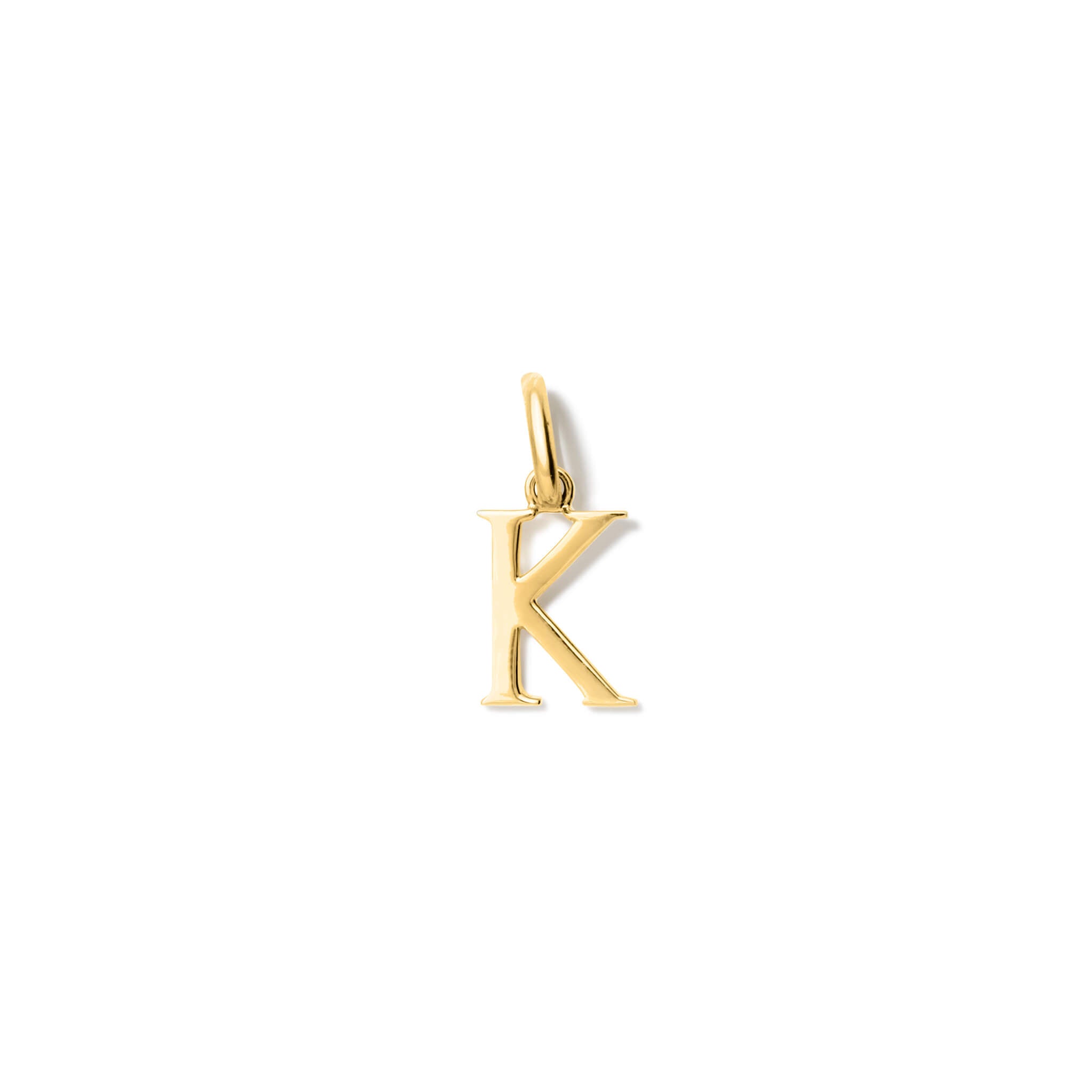 Handcrafted yellow gold initial K necklace pendant, with a loop at the top for chain attachment.