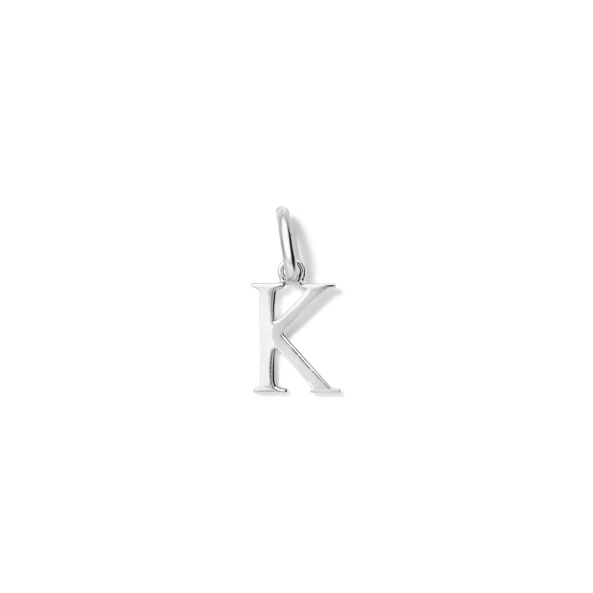 Handcrafted sterling silver initial K necklace pendant, with a loop at the top for chain attachment.
