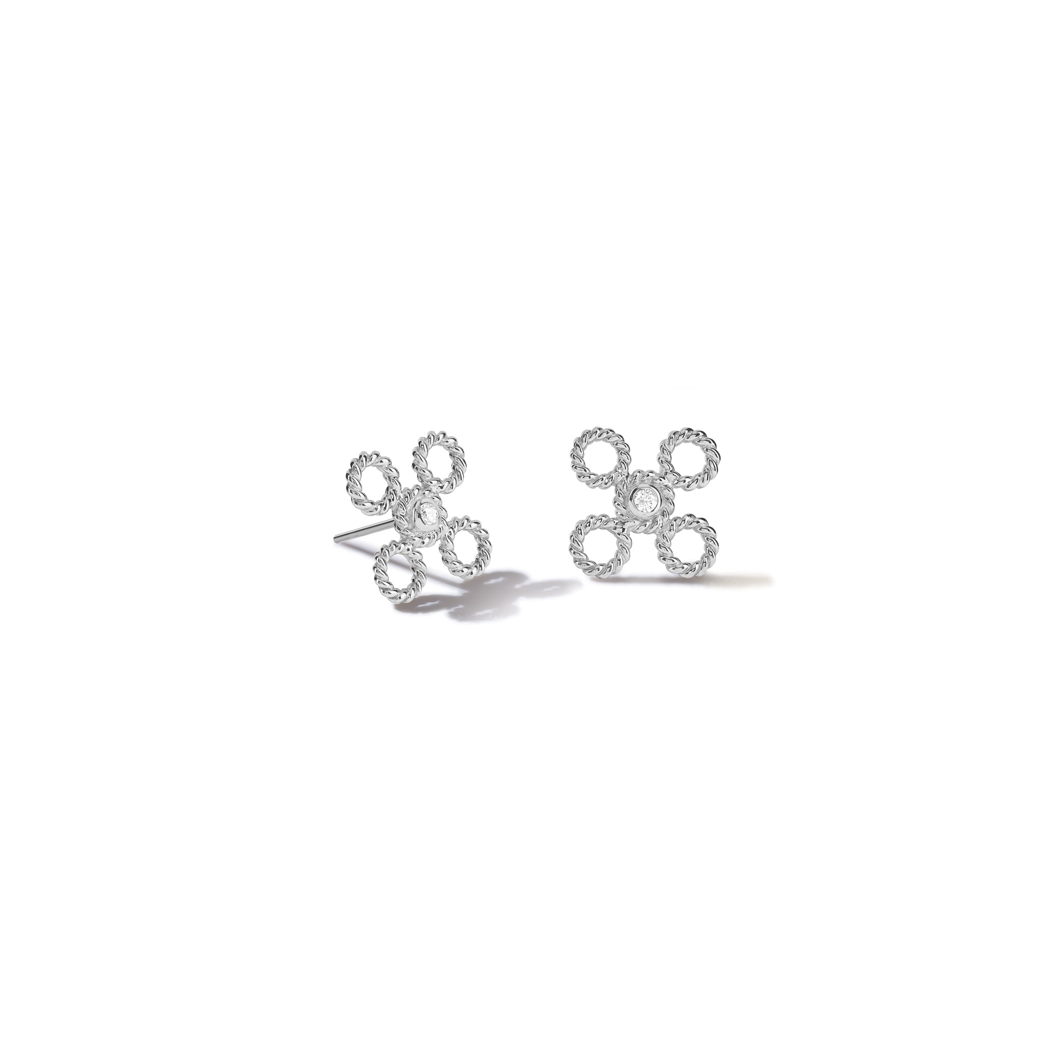 Handcrafted white gold stud earrings featuring a textured rope-like shape with a diamond.