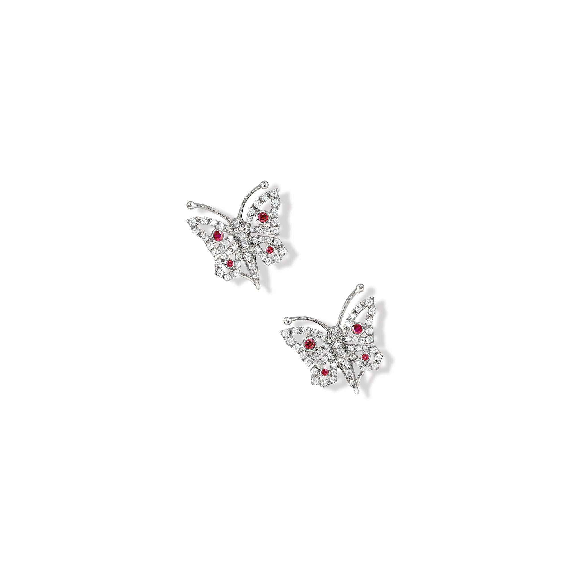 Handcrafted 18ct white gold butterfly shaped earrings with rubies and diamonds.