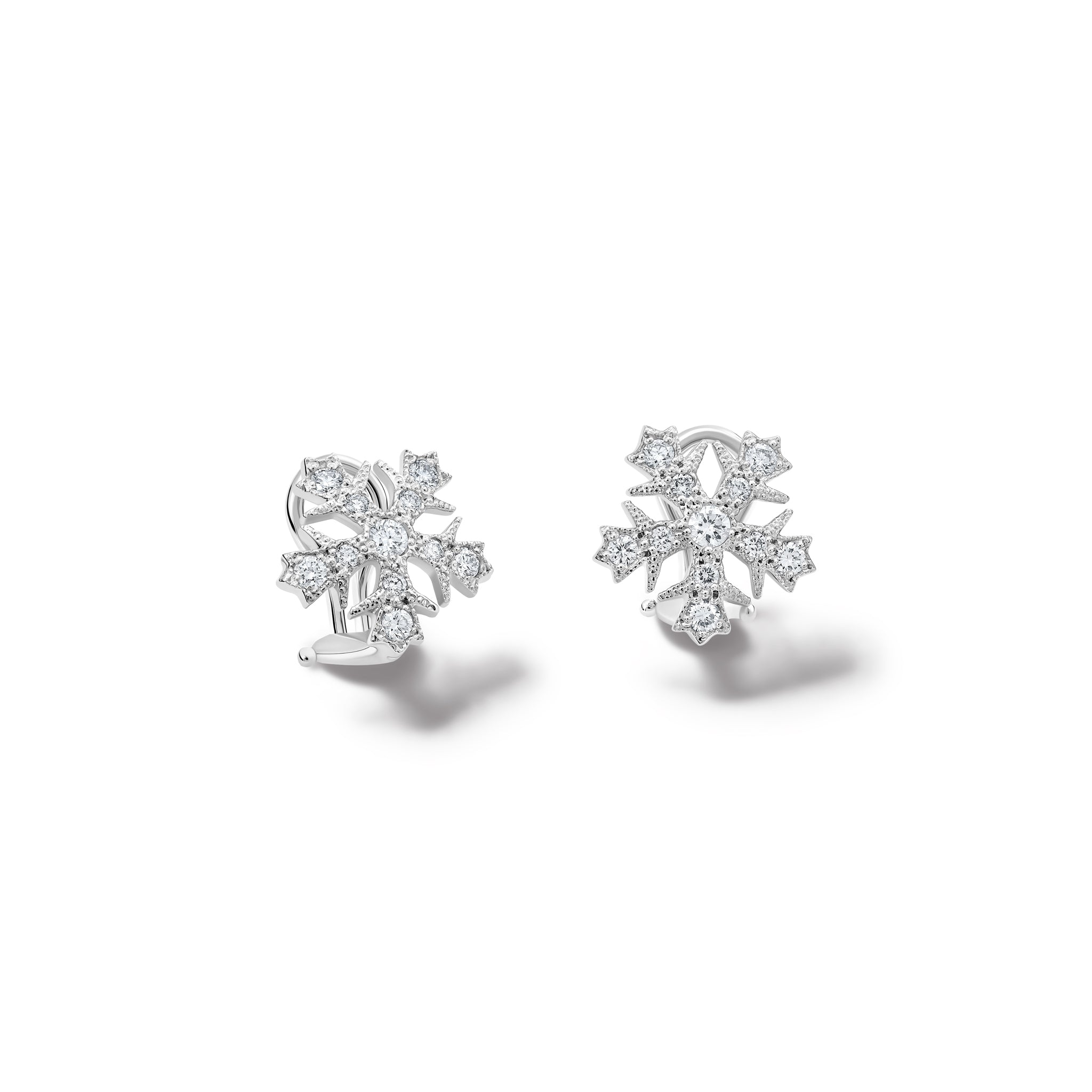 Handcrafted 18ct white gold snowflake shaped earrings with diamonds.