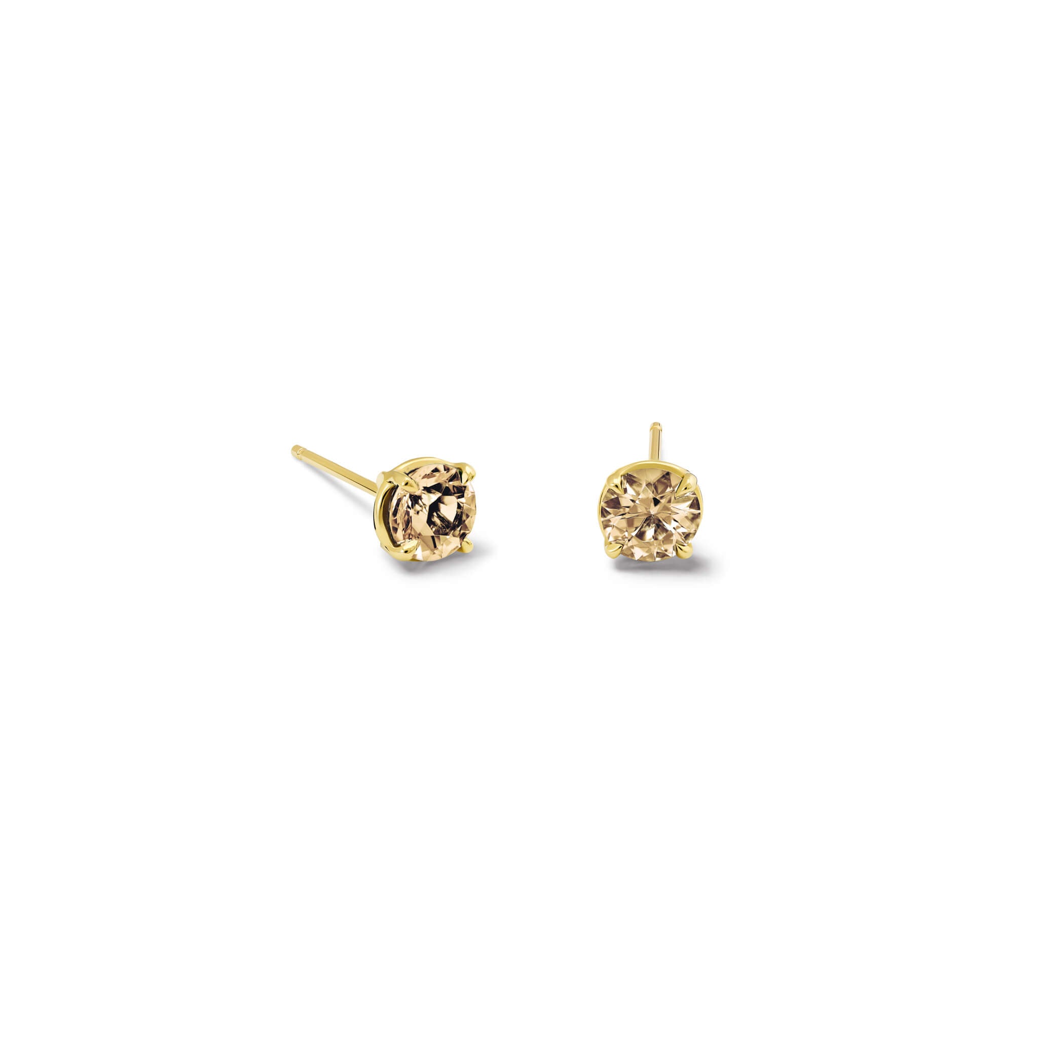 Handcrafted 18ct yellow gold interchangeable stud earrings featuring round champagne coloured diamonds, birthstone of April.