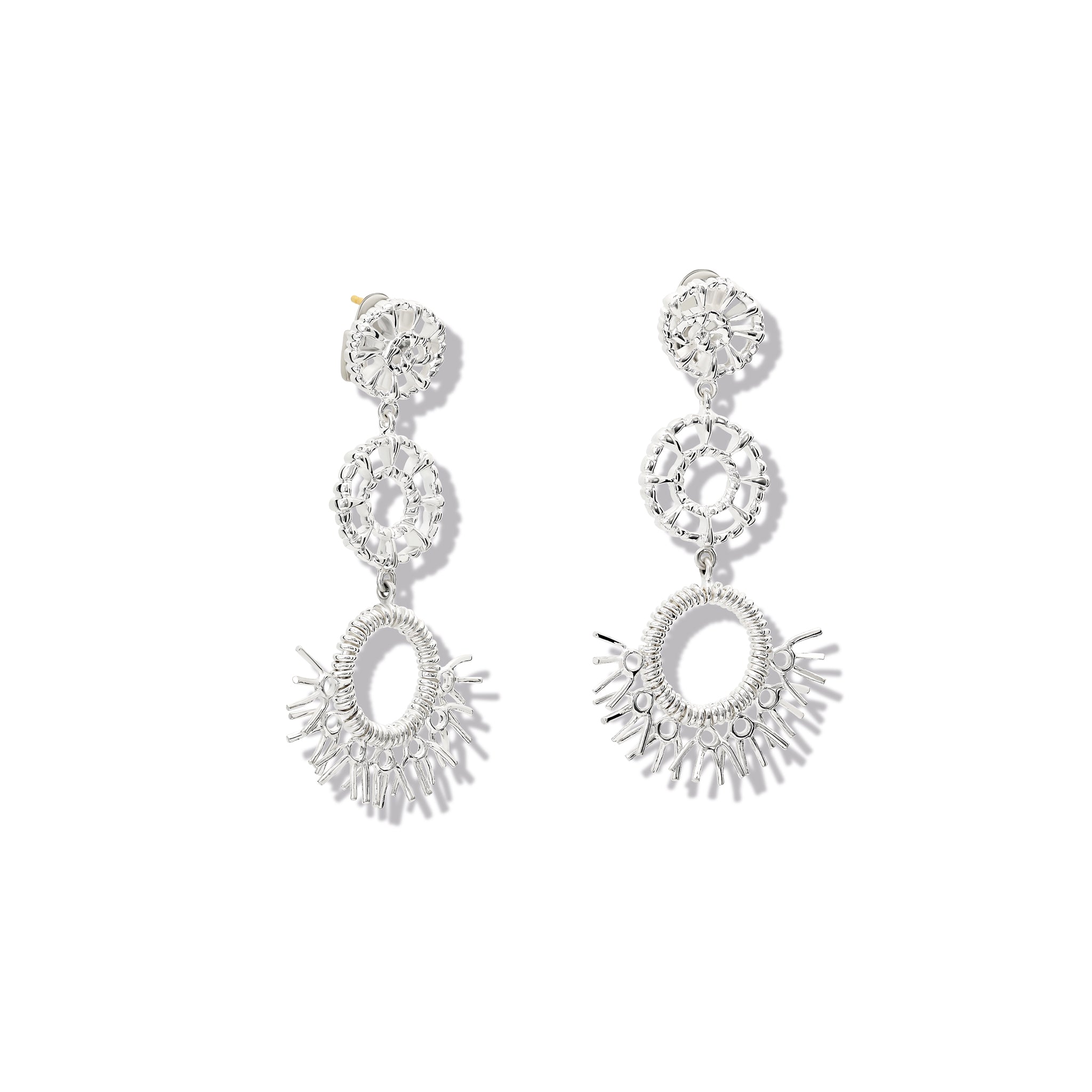 Handcrafted sterling silver earrings in the shape of dried palm fronds from Morocco.