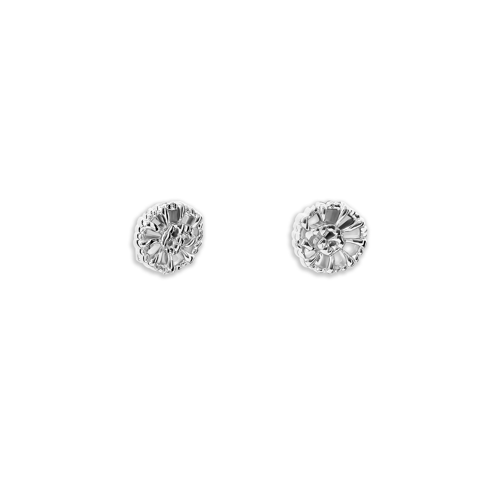 Handcrafted sterling silver earrings in the shape of dried palm fronds from Morocco.