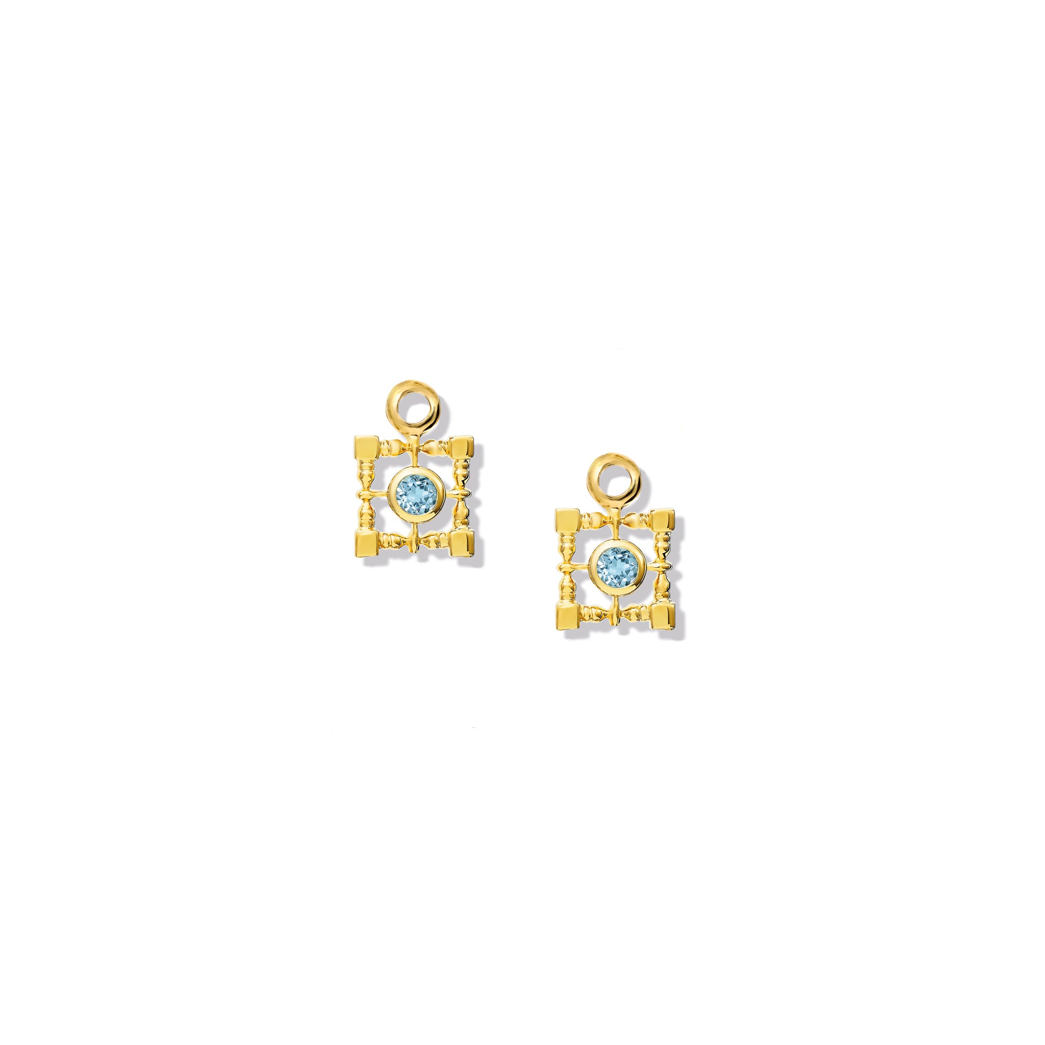 Handcrafted yellow gold earring drops featuring a square-shaped frame with a central blue topaz, birthstone of November.