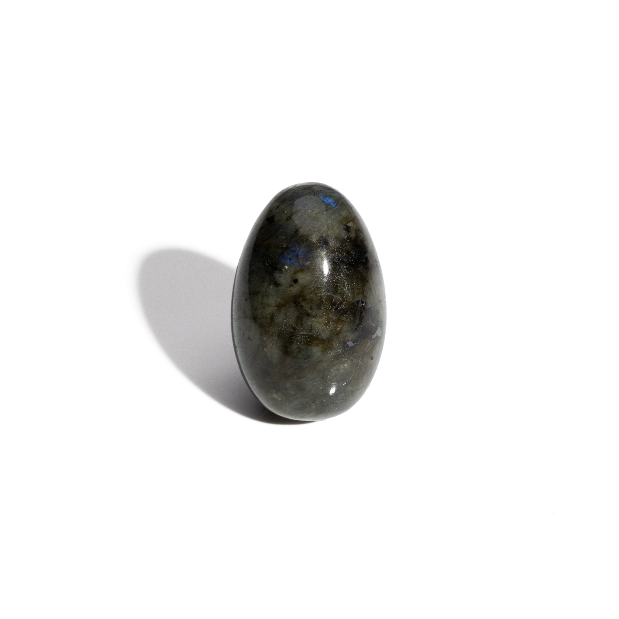 A handcrafted gemstone egg in the precious stone labradorite.