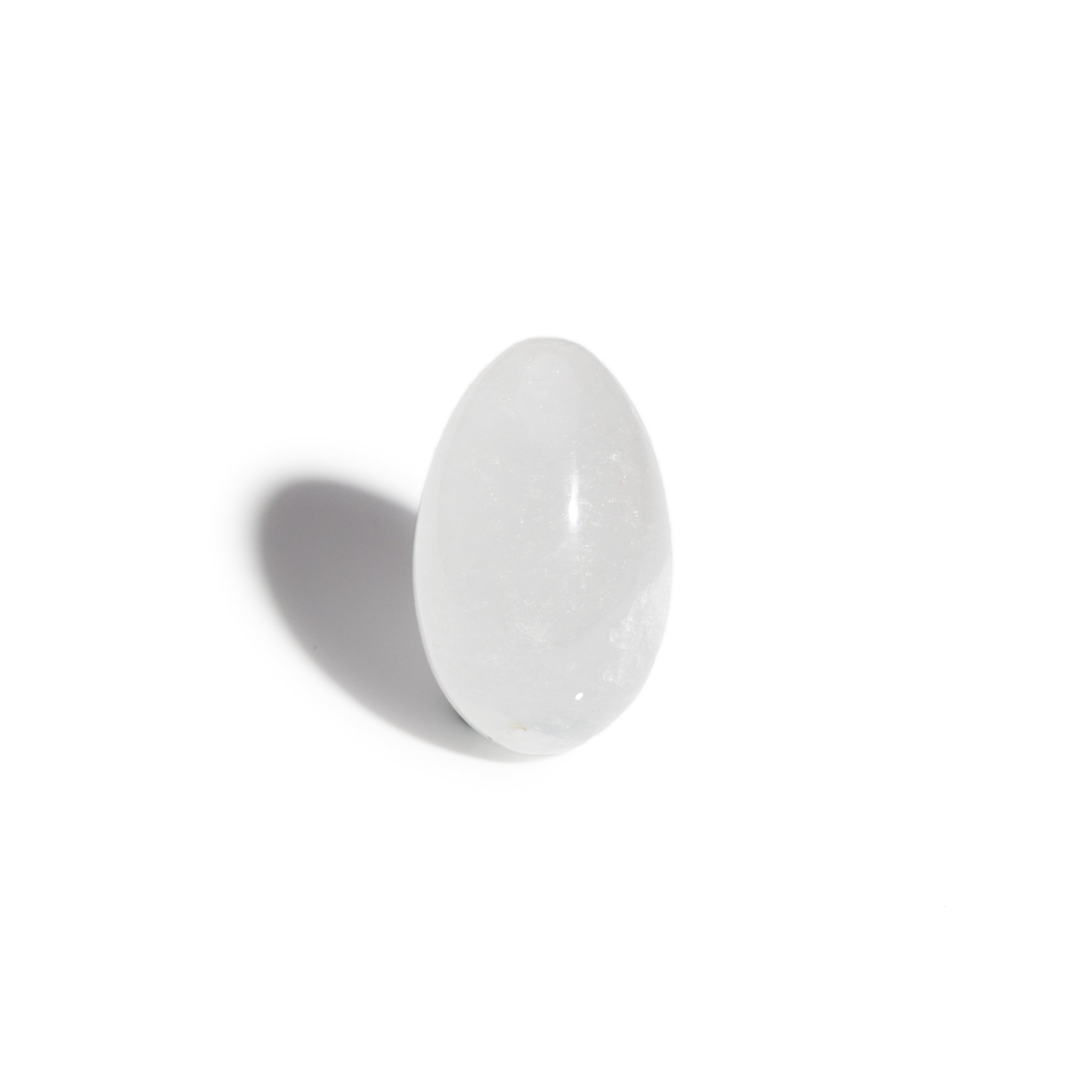 A handcrafted gemstone egg in the precious cloudy quartz.