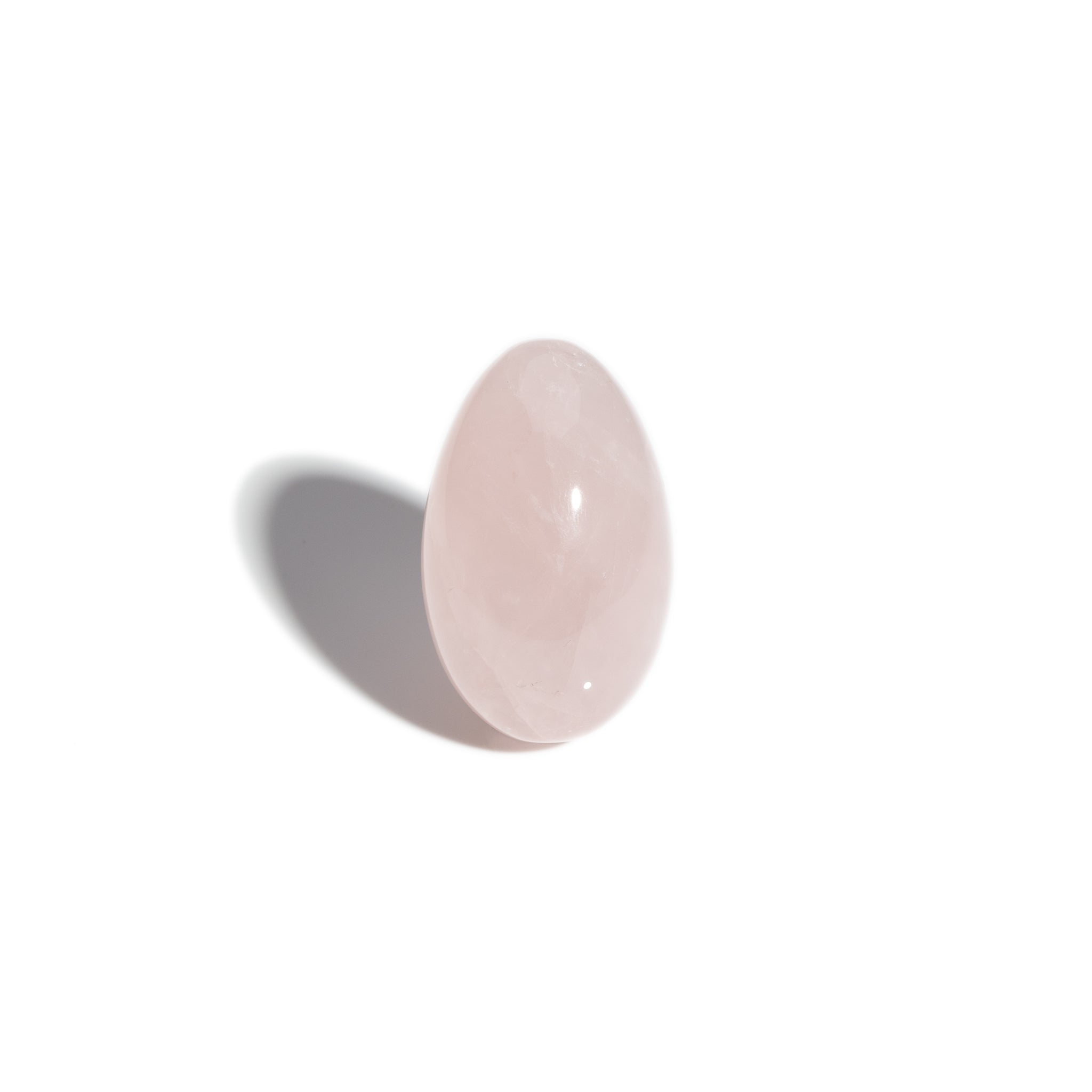 A handcrafted gemstone egg in the precious stone rose quartz.