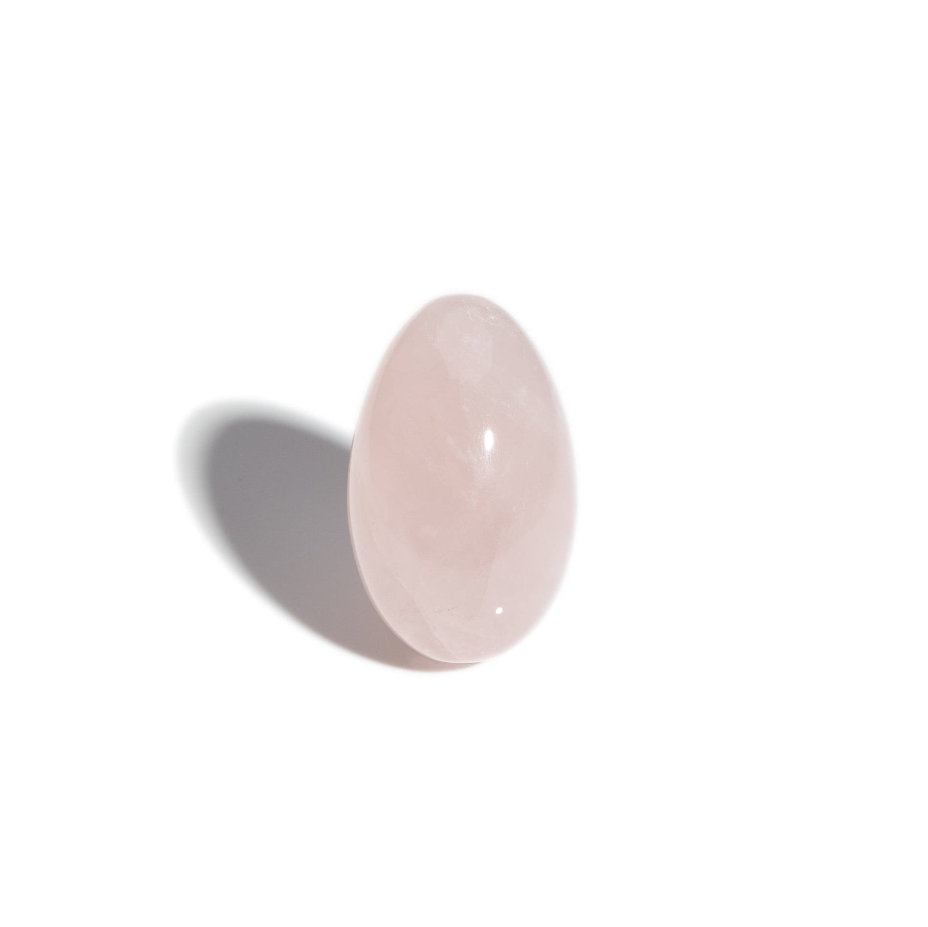 A handcrafted gemstone egg in the precious stone rose quartz.