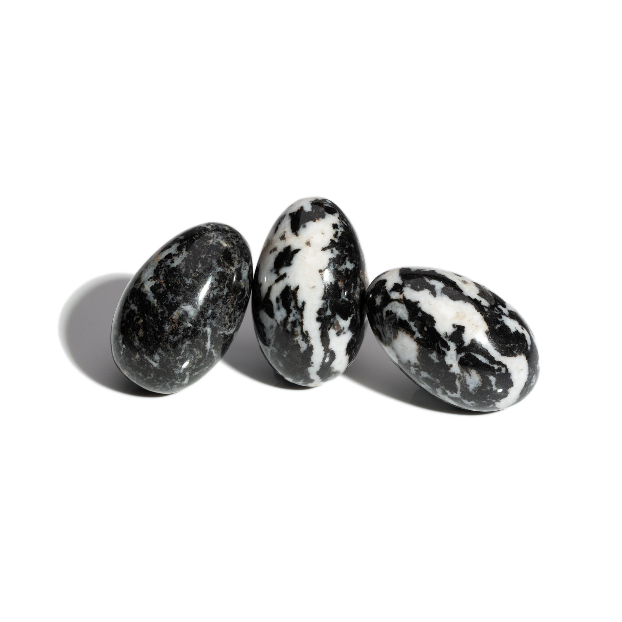 Three handcrafted gemstone eggs in the precious stone zebra jasper.