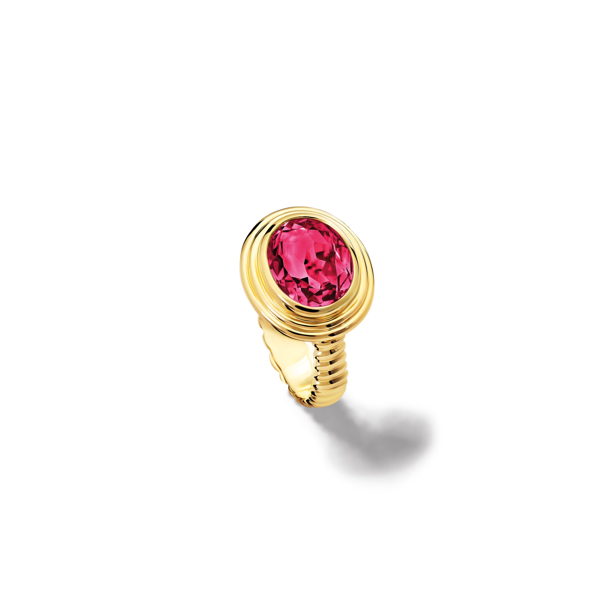 Handcrafted yellow gold ring featuring a prominent oval rhodolite garnet, birthstone of January.