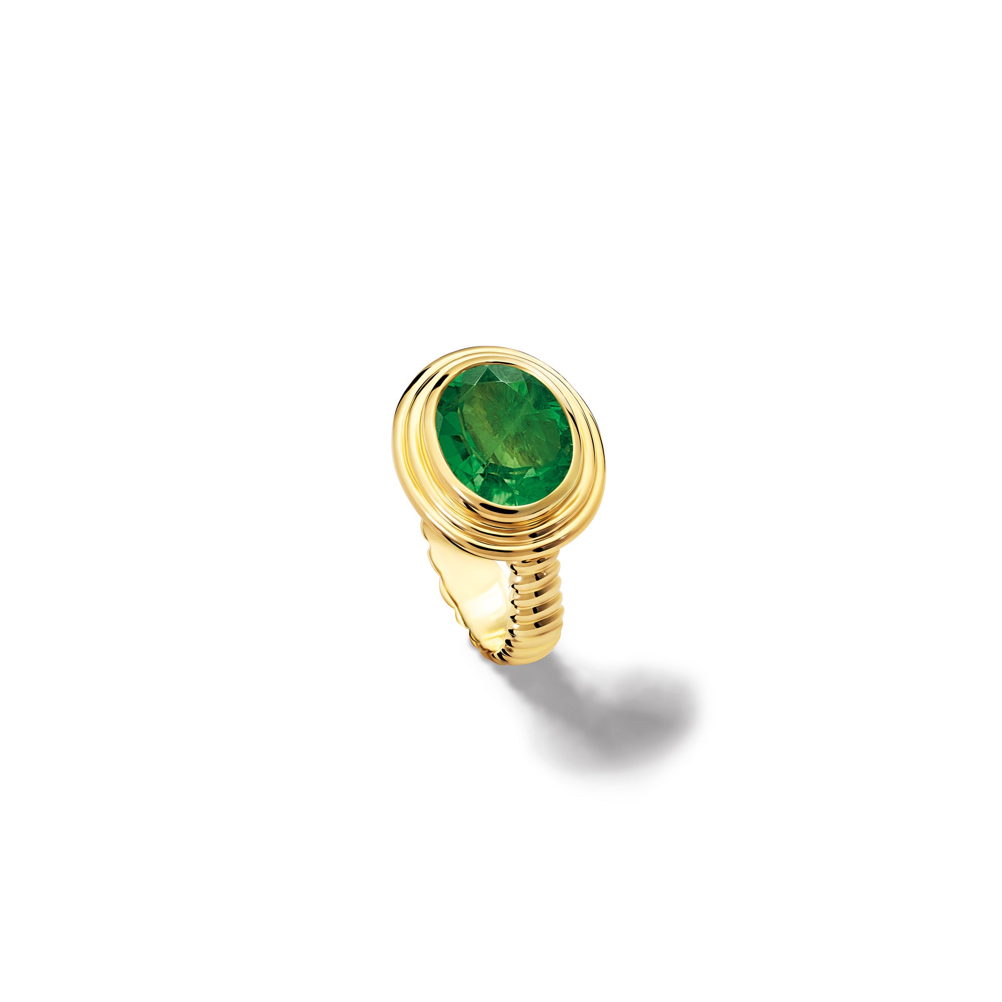 Handcrafted 18ct yellow gold ring featuring a prominent oval tsavorite garnet.