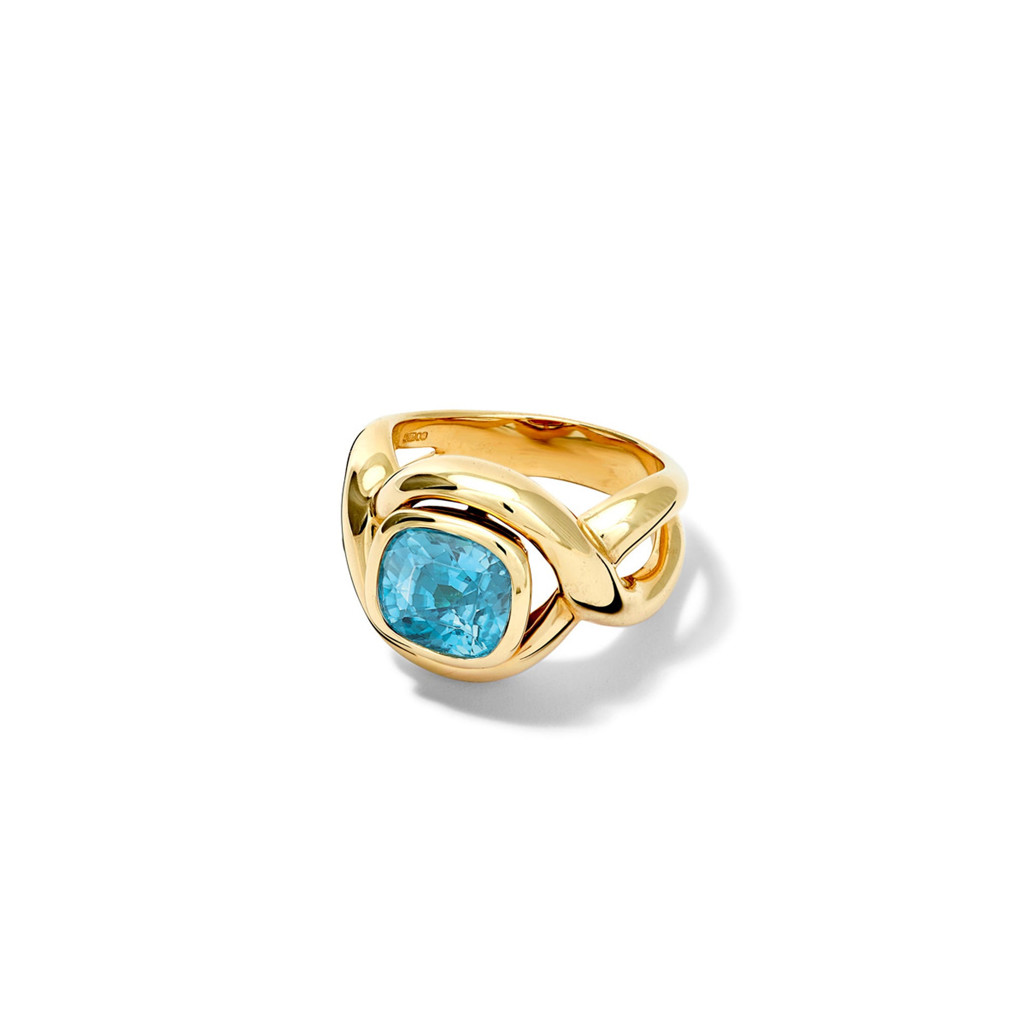 Handcrafted yellow gold ring featuring curved shanks with a round blue zircon.