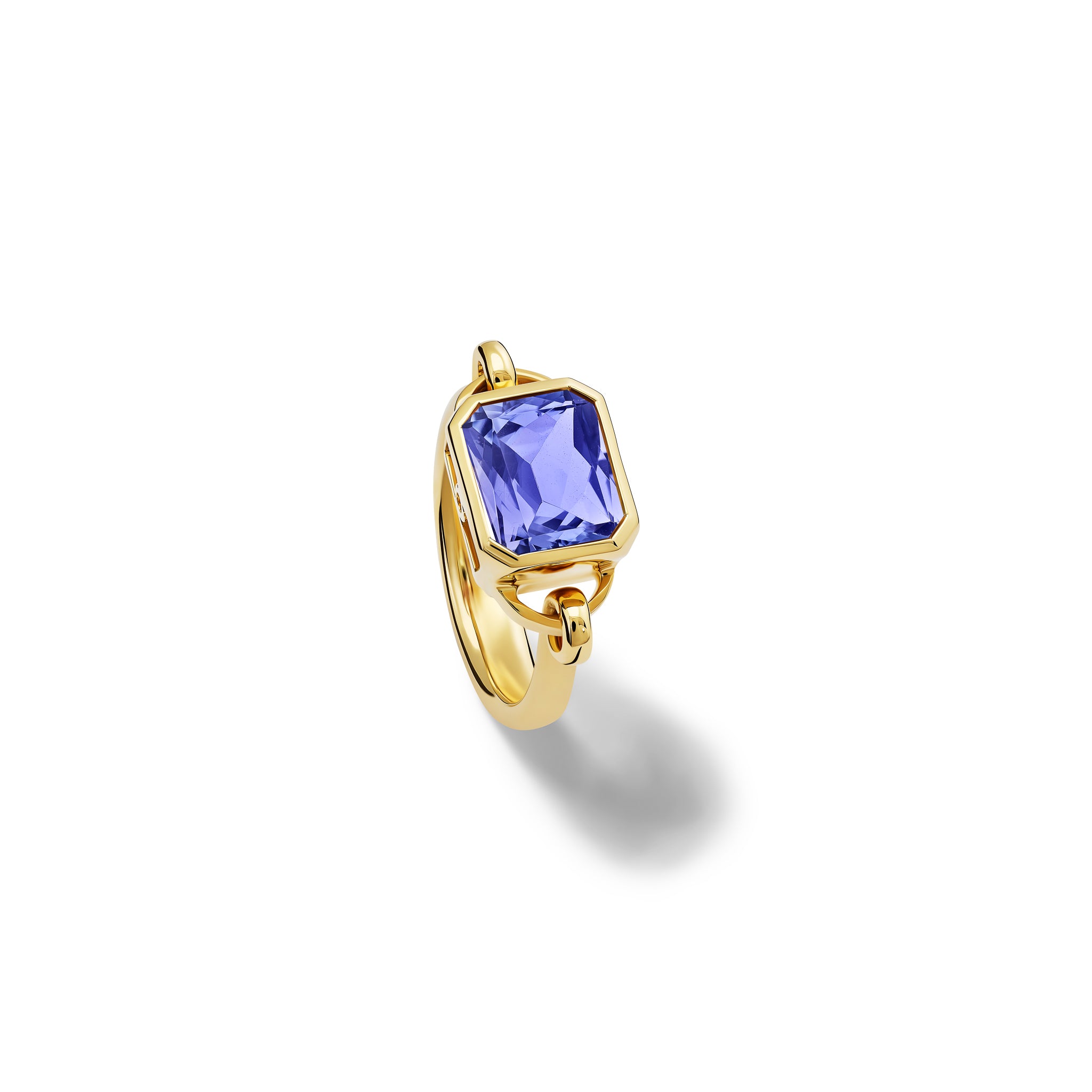 Handcrafted 18ct yellow gold ring featuring a central tanzanite, birthstone of December.