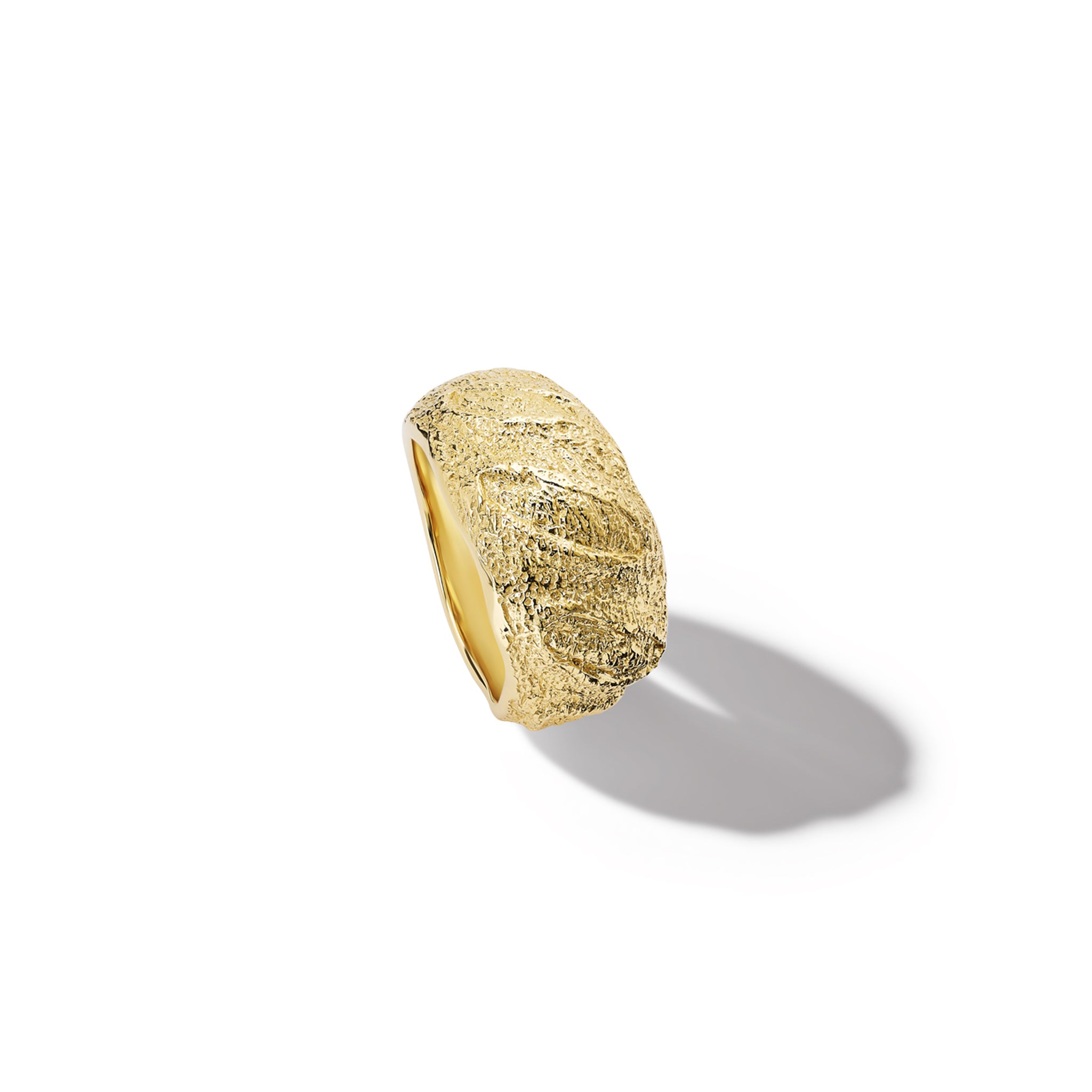 Handcrafted yellow gold ring with a texture of a freshly baked baguette.