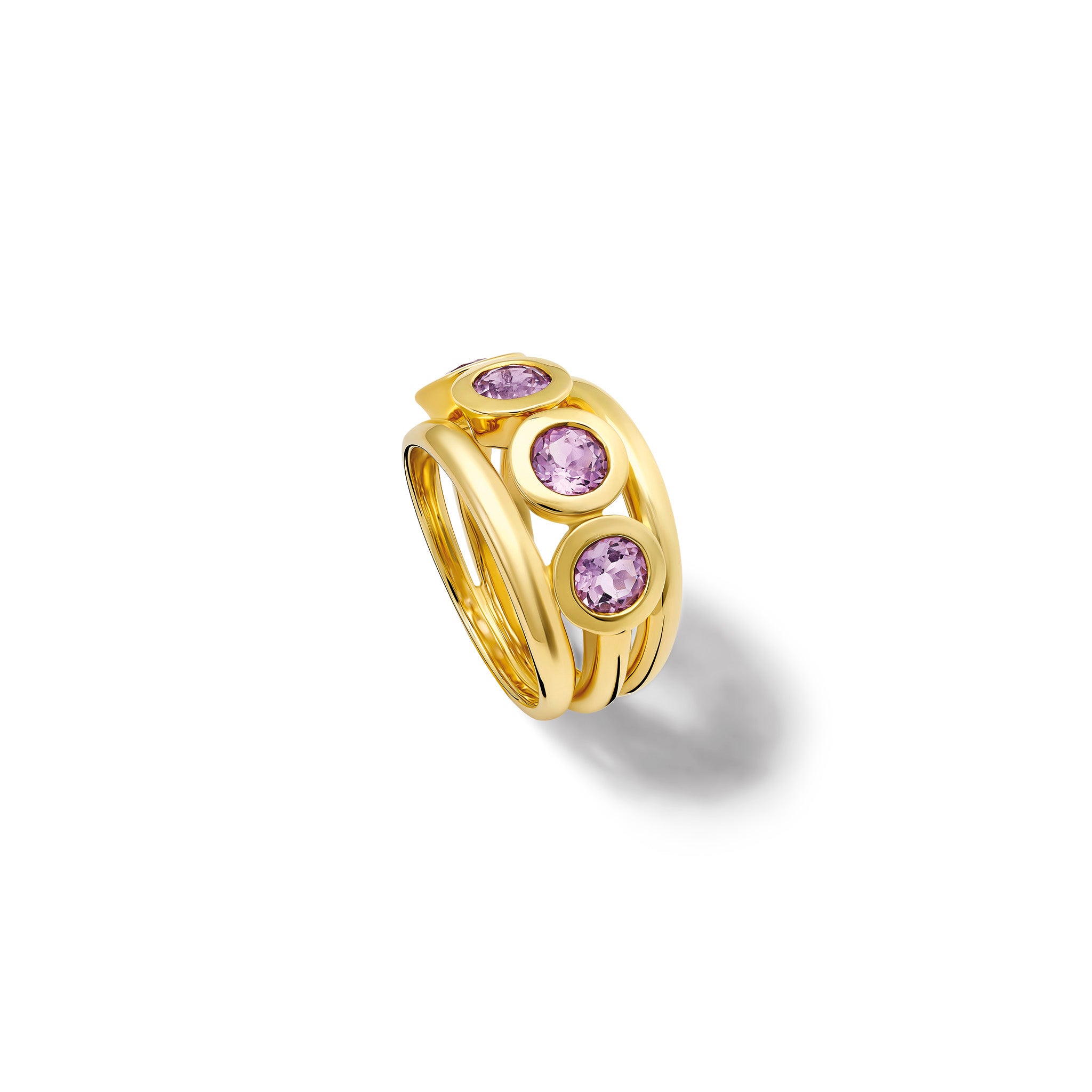 Handcrafted yellow gold ring with a bold band and five circular amethyst gemstones, birthstone of February, in bezel settings.