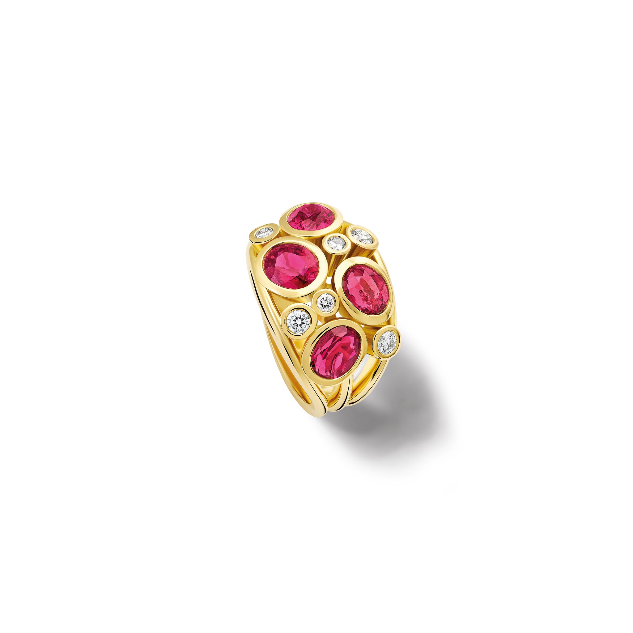 Handcrafted 18ct yellow gold ring featuring four rubies and smaller diamonds.