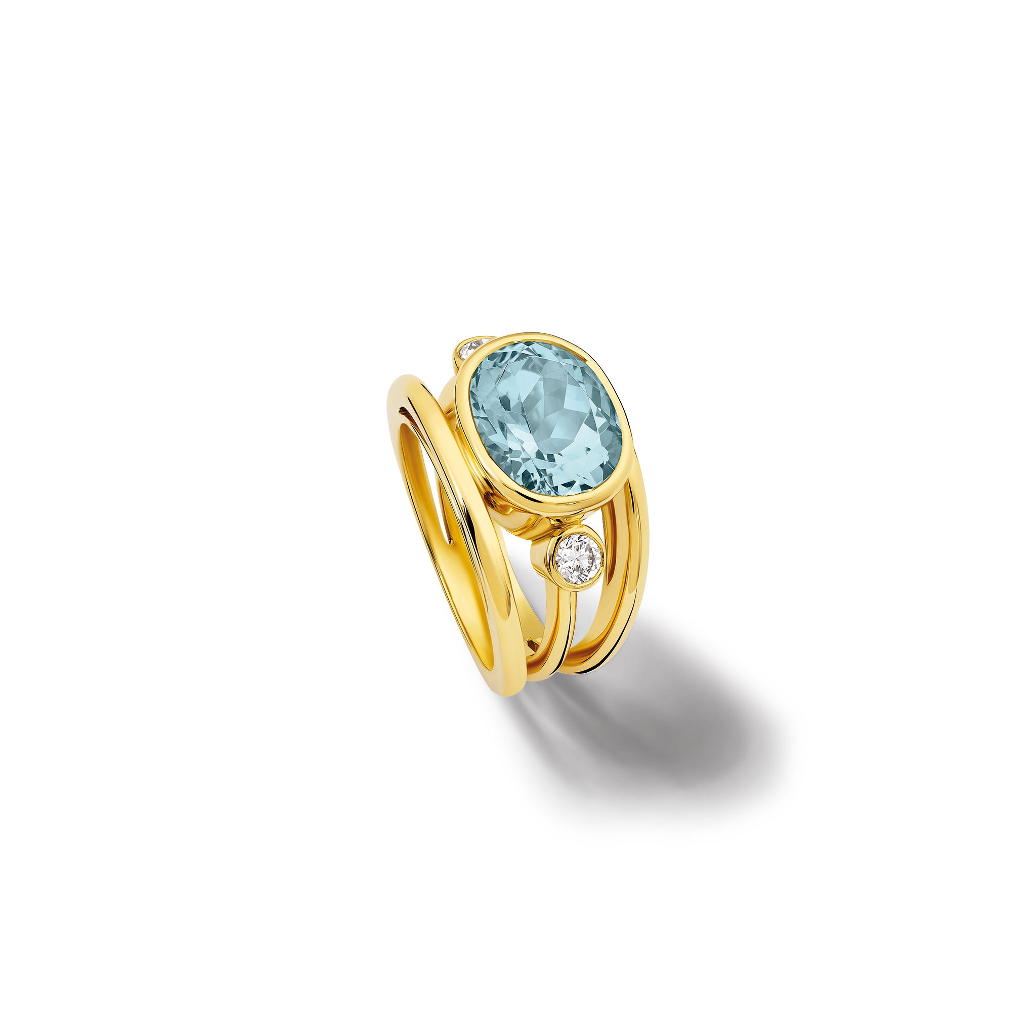 Handcrafted 18ct yellow gold ring with a central aquamarine, the birthstone of March, flanked by two round diamonds.