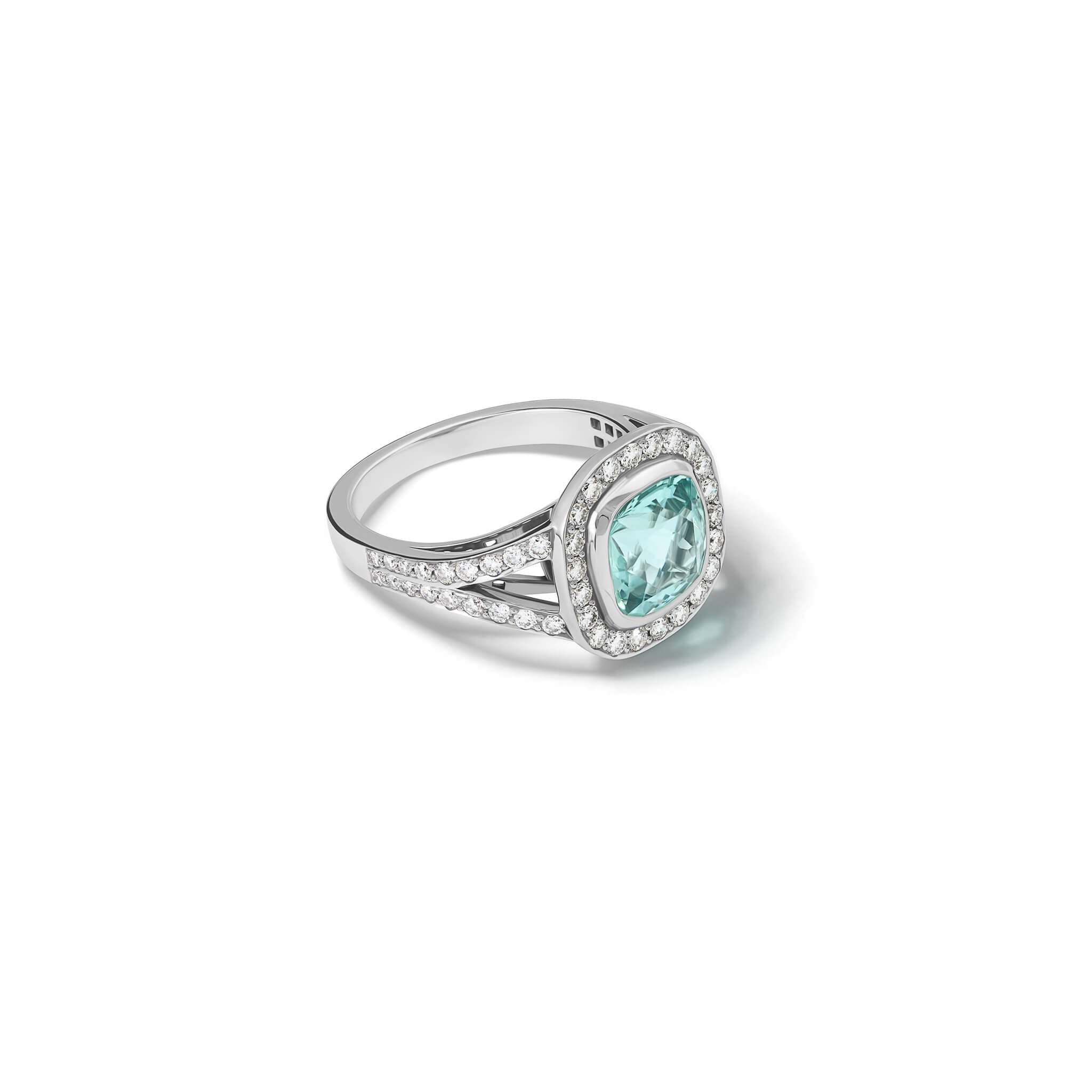 Handcrafted 18ct white gold engagement ring featuring a rub over set cushion-cut aquamarine surrounded by a halo of small diamonds and smaller diamonds embedded along the band.