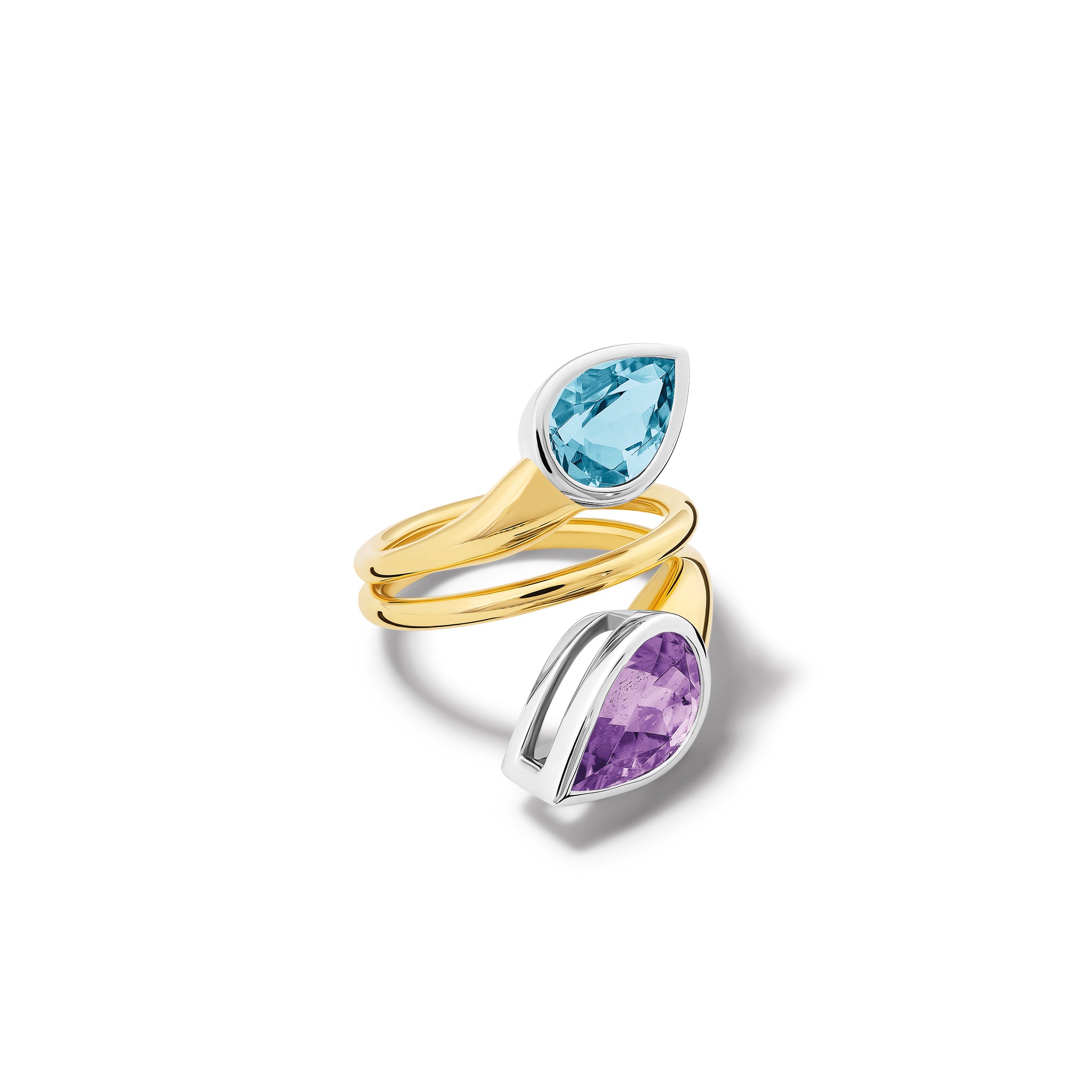 Handcrafted 18ct yellow and white gold swirl ring featuring teardrop shaped purple tourmaline and aquamarine at each end.