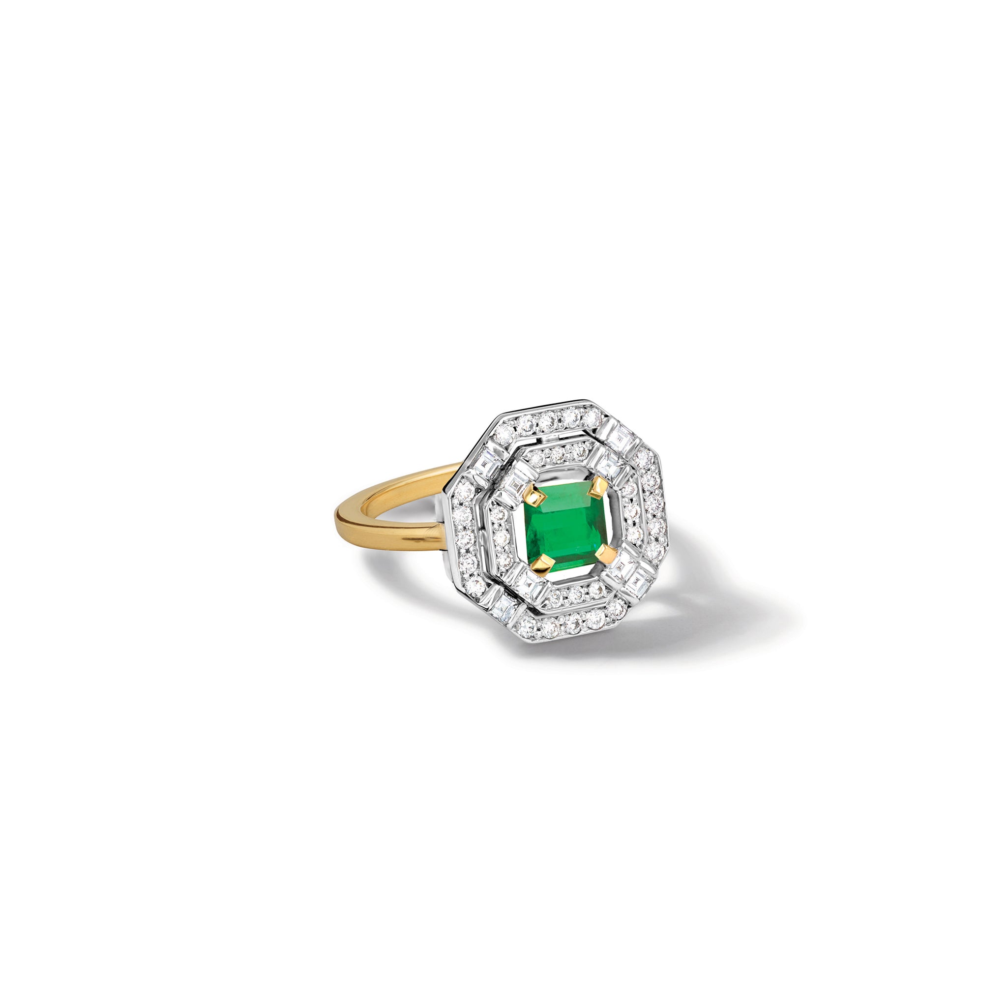 Handcrafted 18ct yellow gold engagement ring featuring a central square-cut green emerald, surrounded by two tiers of small round diamonds set in a hexagonal pattern. The engagement ring band is gold, and the gemstone setting is white gold.