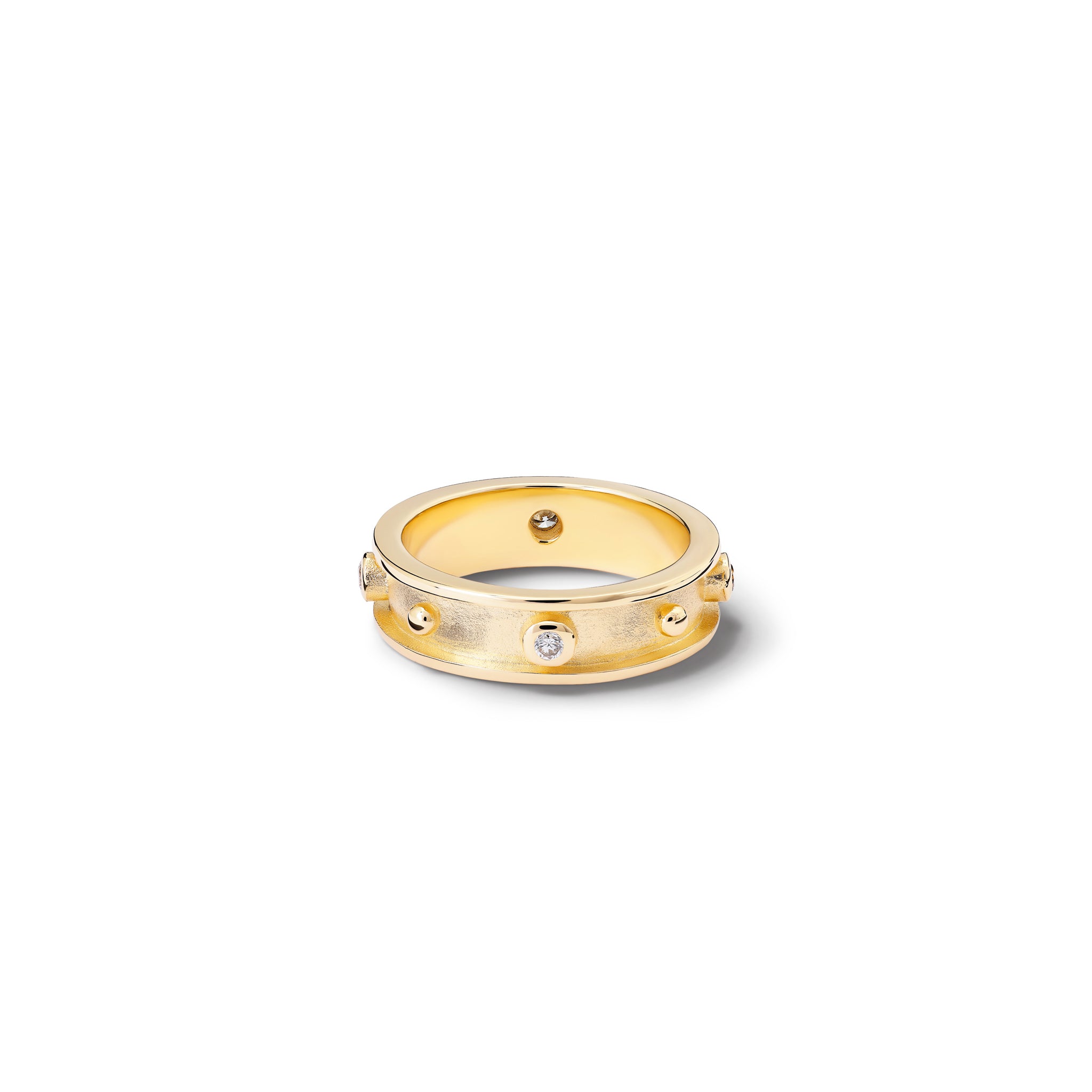 Handcrafted yellow gold ring with evenly spaced, protruding round dots with diamonds.