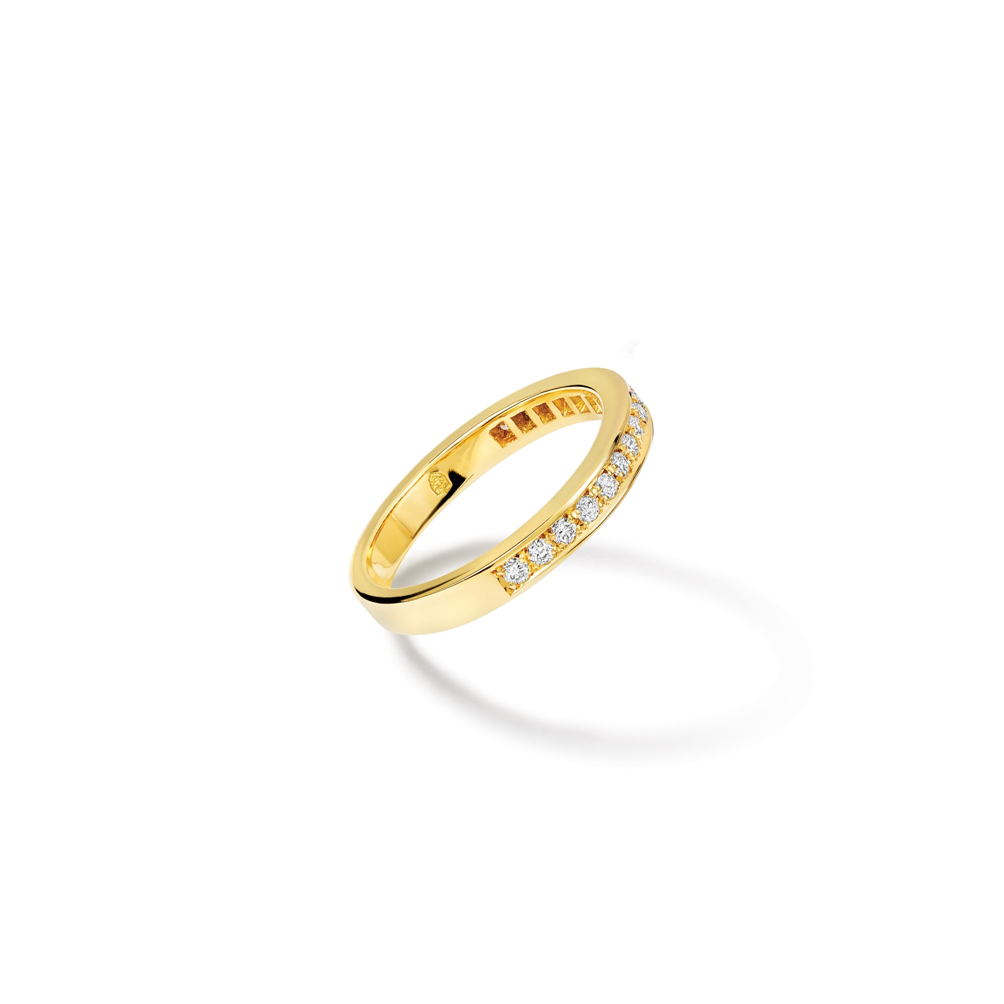 Handcrafted 18ct white gold wedding band with diamonds set along half of the band.
