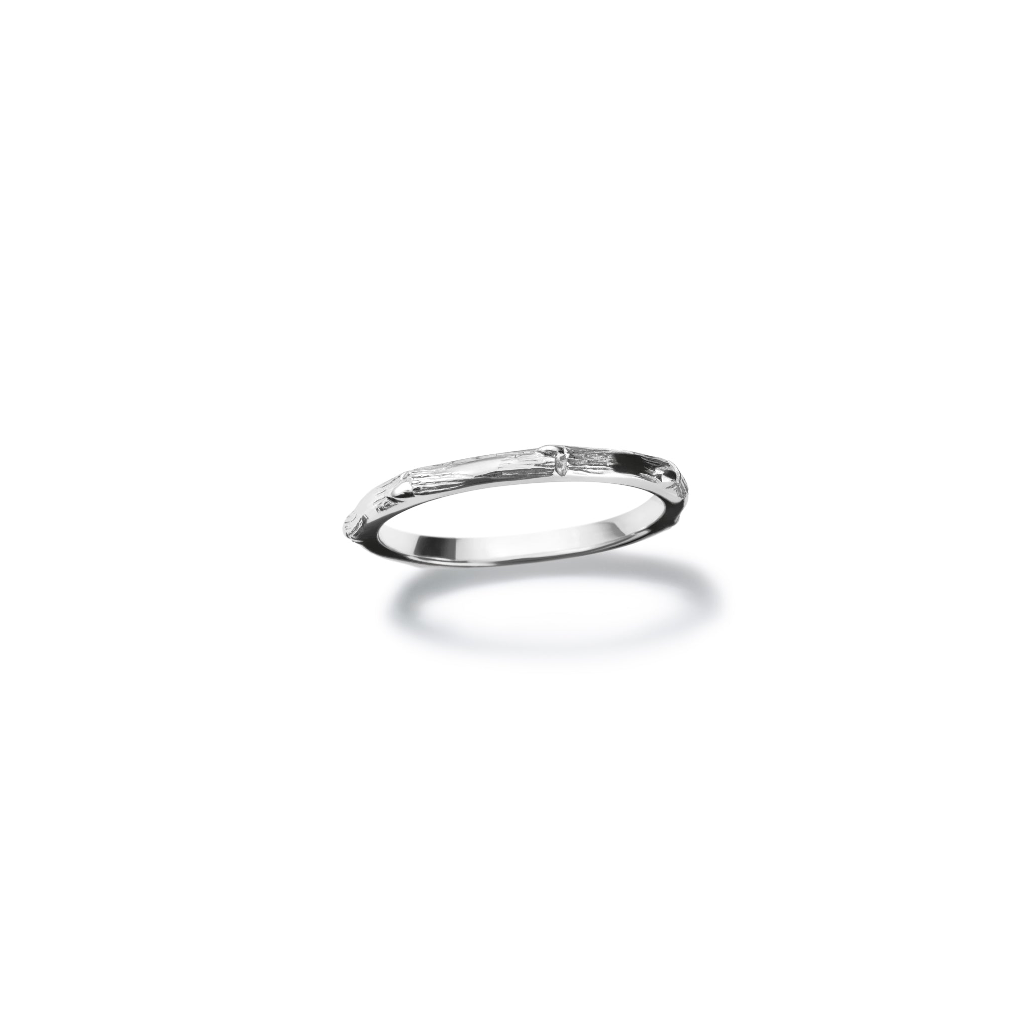 Handcrafted 18ct white gold ring designed with the intricate pattern and texture of bamboo.
